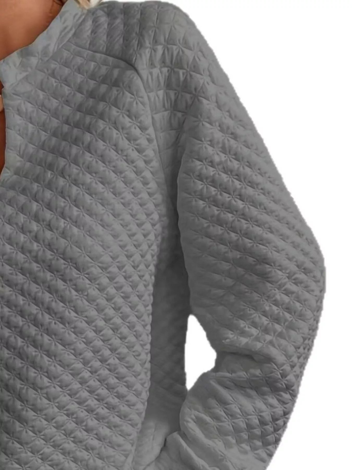 Quilted Texture Long Sleeve Sweatshirt with Notched Neck showcasing a stylish design and comfortable fit.