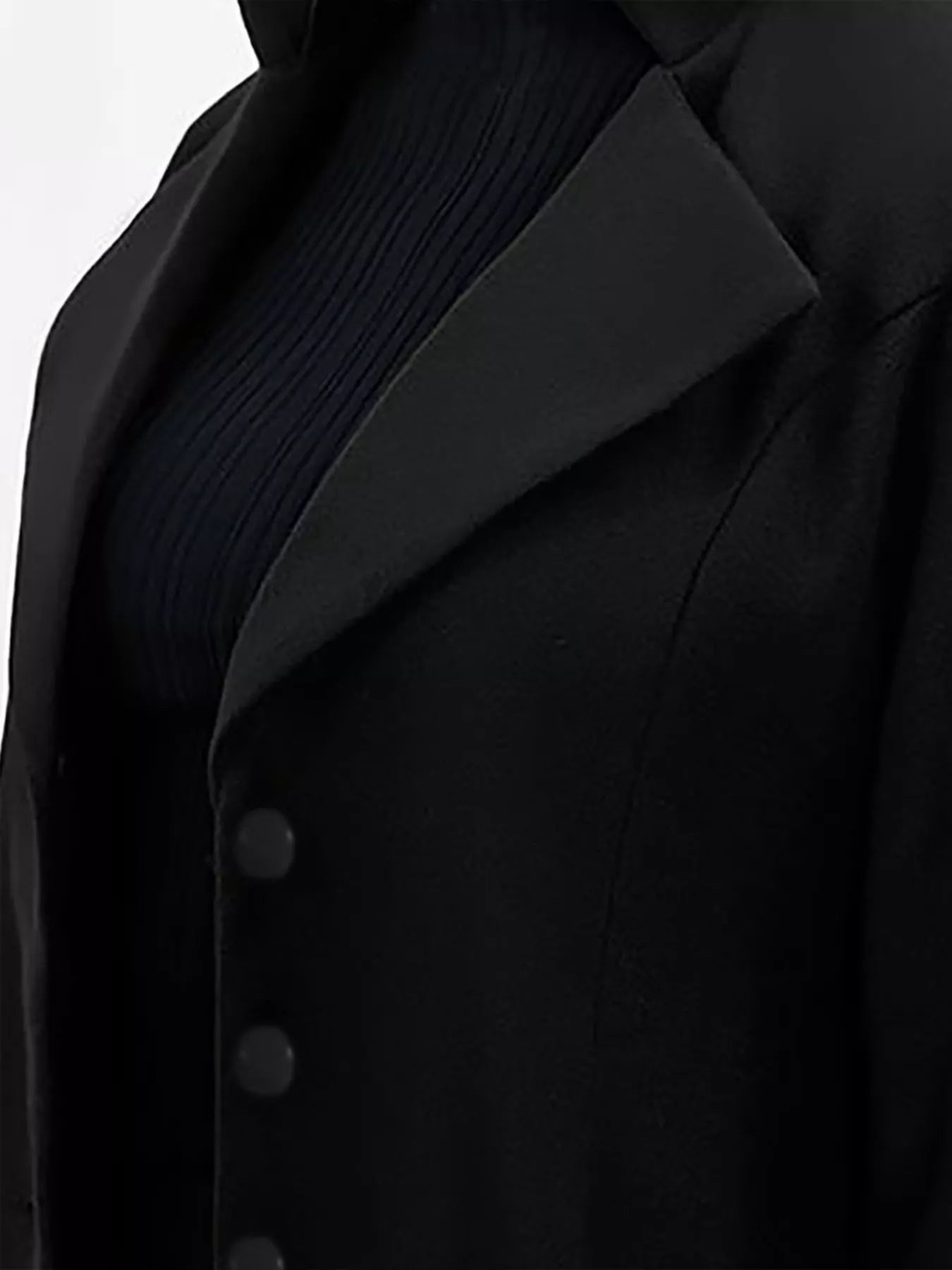 Close-up of the Full Size Single Breasted Long Sleeve Overcoat for Women, showcasing button detail and collar.