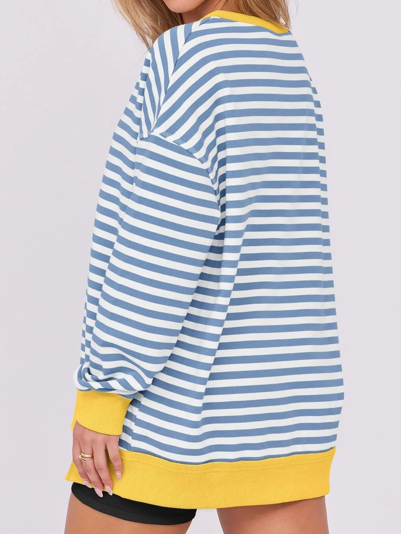 Notched Long Sleeve Oversized Sweatshirt with blue and white stripes and yellow trim, perfect for casual wear.