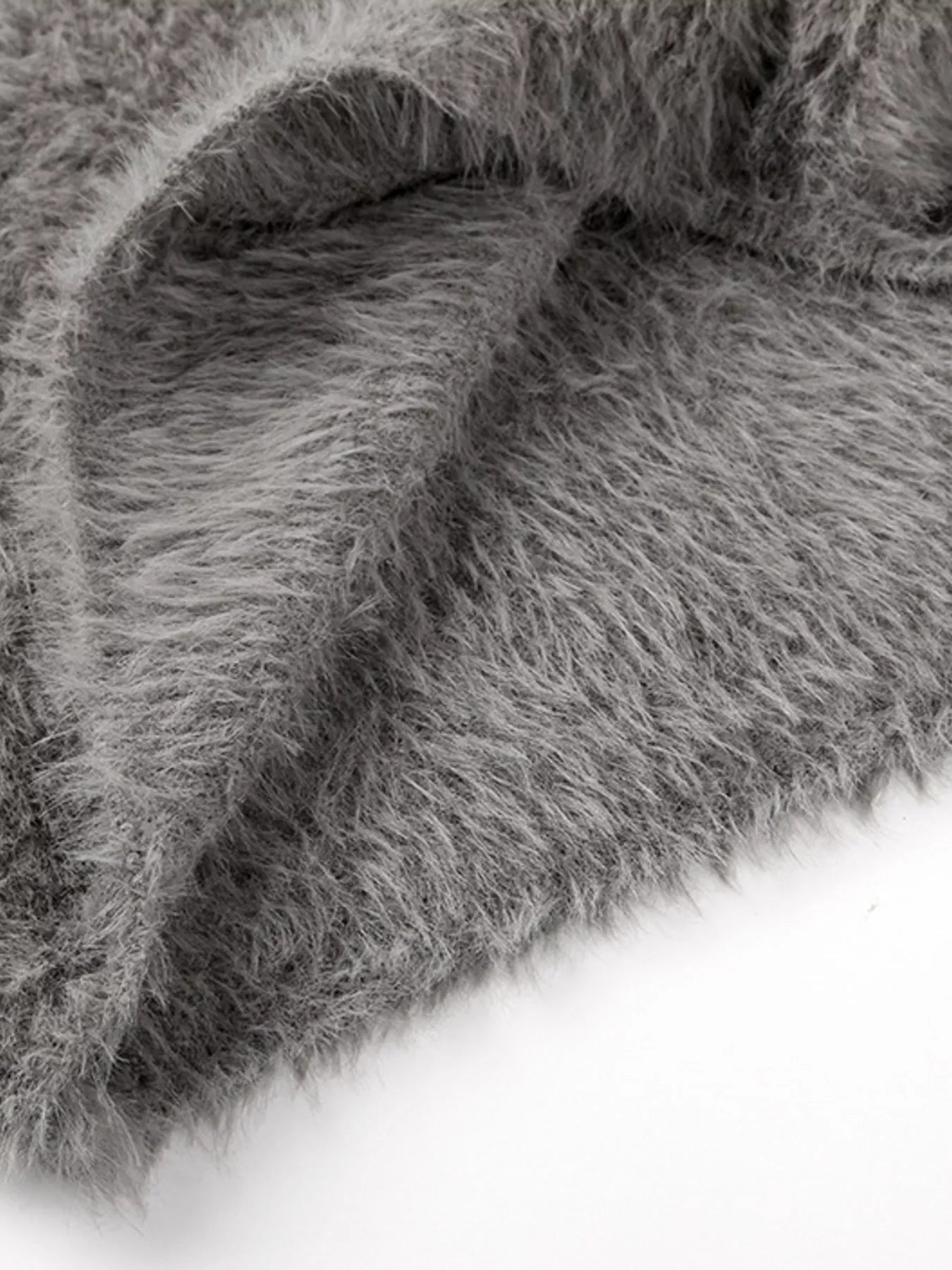 Fuzzy Round Neck Long Sleeve Sweater soft gray fabric close-up showing cozy texture and plush feel.