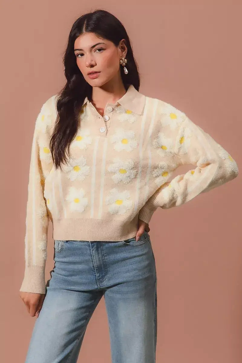 Model wearing SO ME floral stripe polo collar sweater featuring floral patterns and a polo collar.