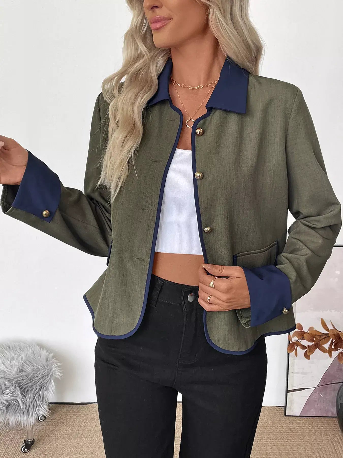 Woman wearing a stylish Contrast Trim Button-Up Jacket, featuring a tailored fit and contrasting color trim.