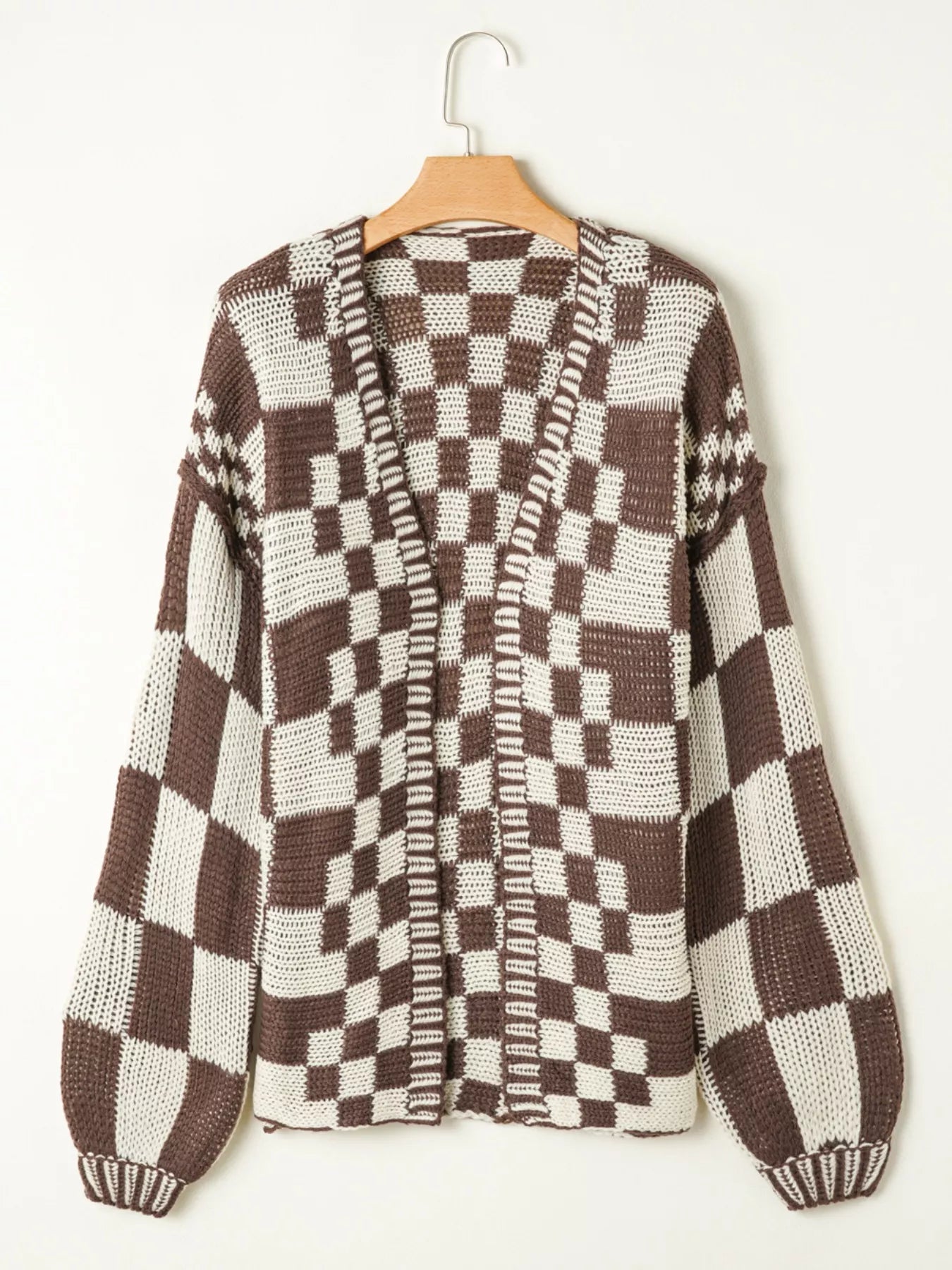 Checkerboard Pattern Sweater Cardigan – Cozy Knit Layer in brown and white on a hanger.