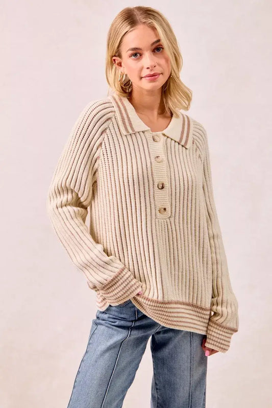 BiBi half button ribbed two tone sweater styled with jeans for a chic casual look.