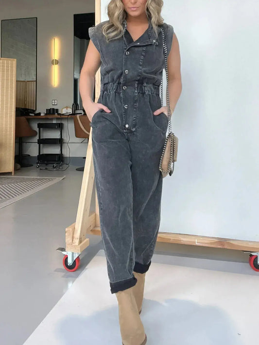 Full size denim jumpsuit with cap sleeves and belted waist, perfect for plus size fashion.