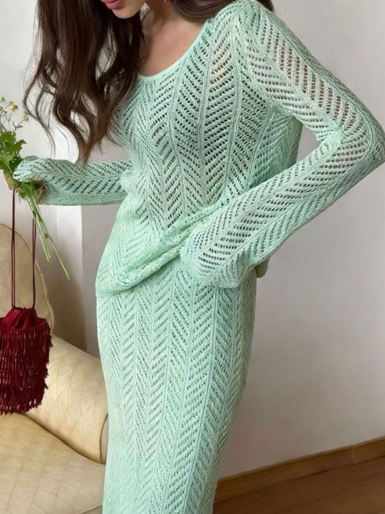 Openwork Long Sleeve Knit Top and Skirt Set in mint green, featuring a fitted design and slightly stretchy fabric.
