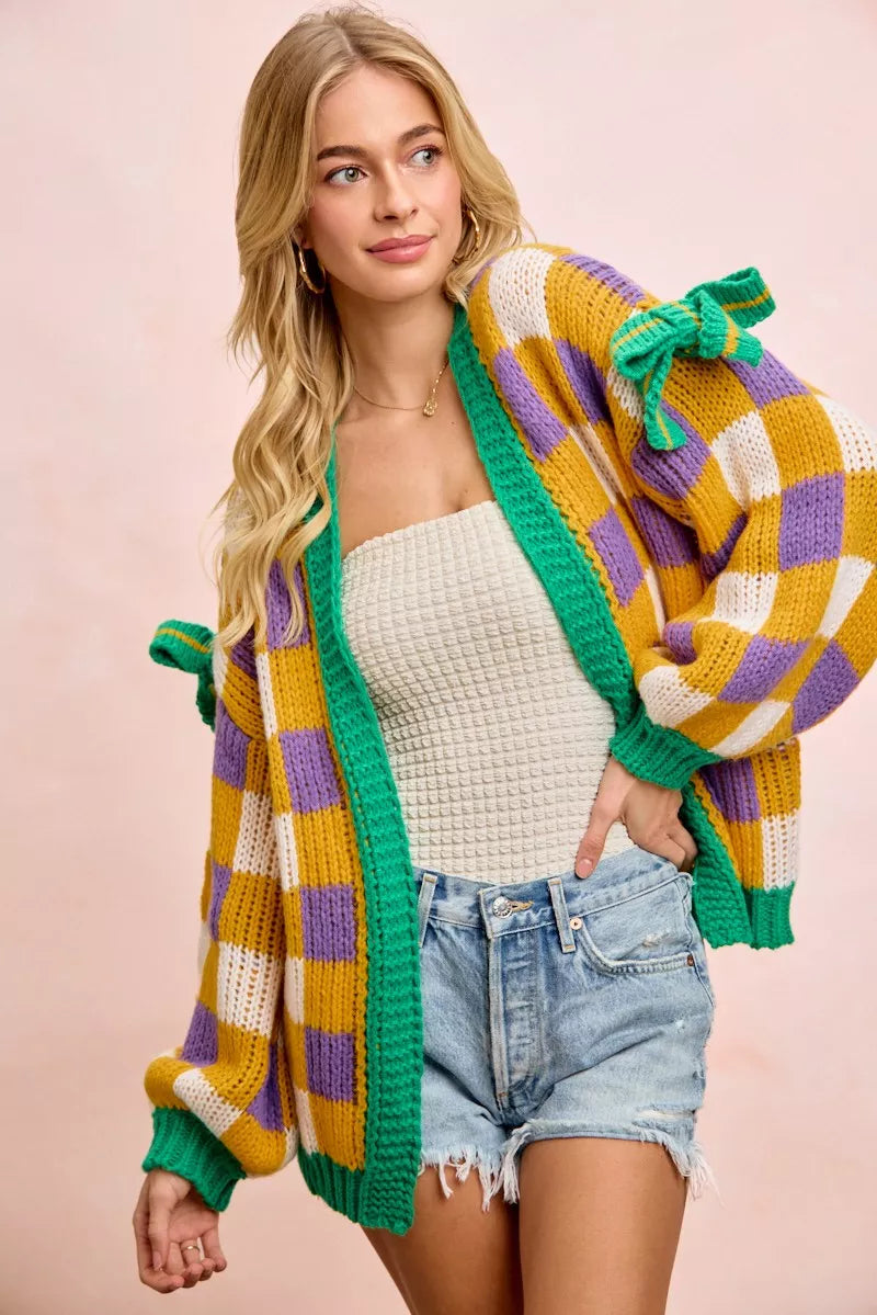 Bibi Mardi Gras Checker Board Front Open Cardigan for Women worn with a stylish outfit featuring vibrant colors and a playful design.