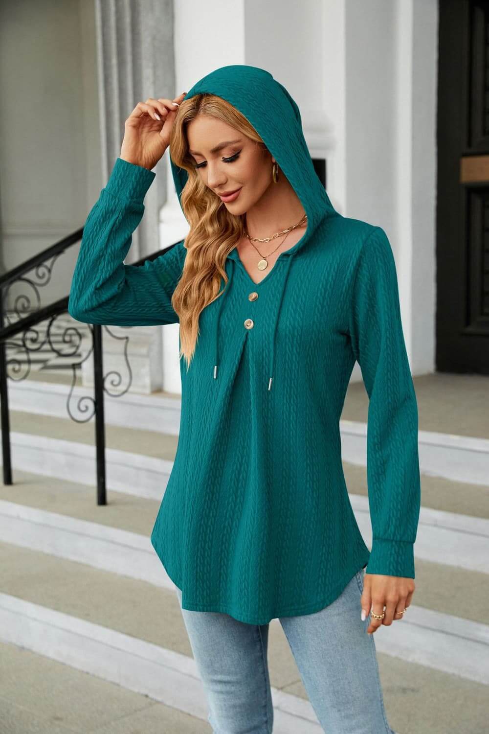 Long Sleeve Hooded Blouse in teal featuring a drawstring hood and button details for casual style.
