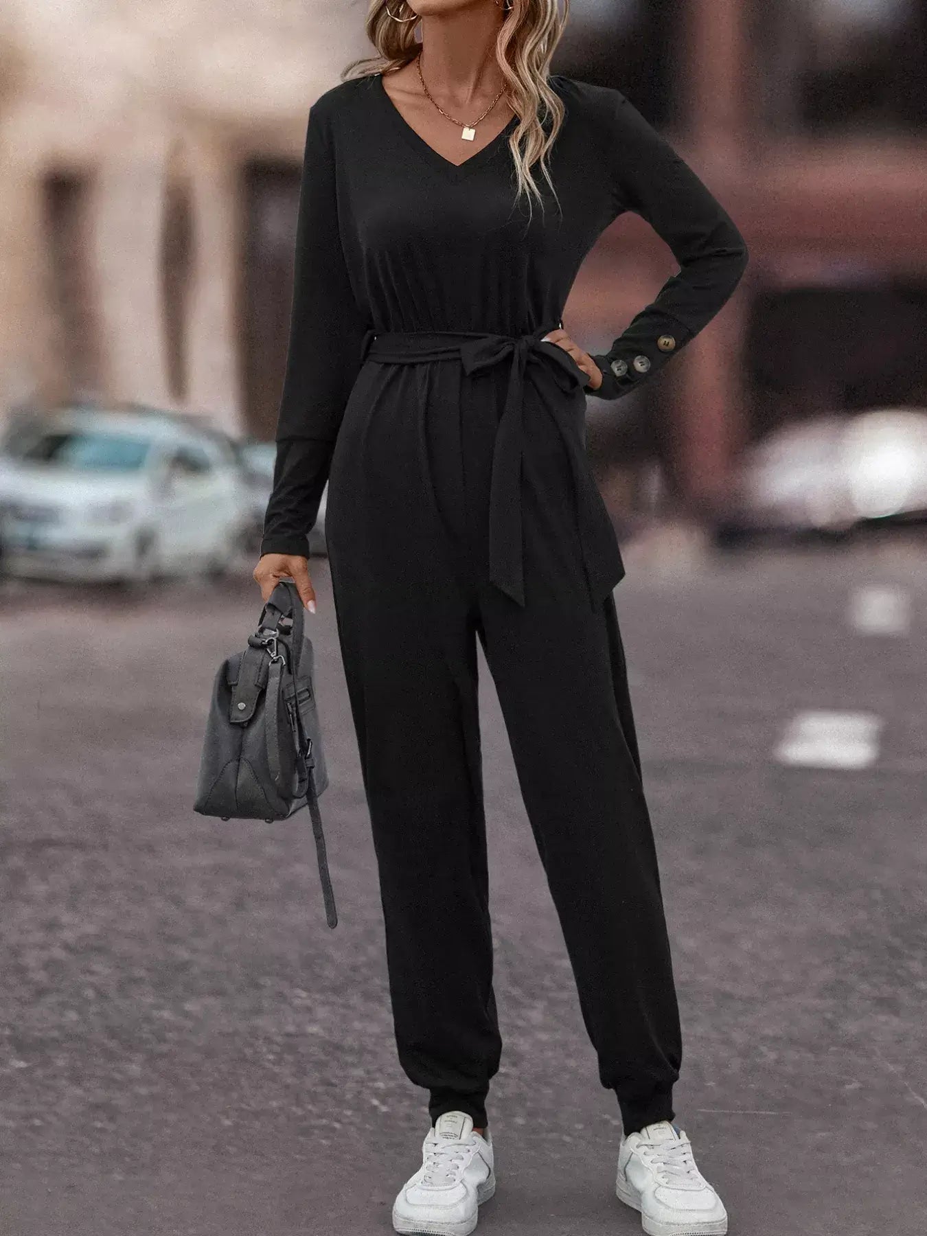 V-Neck Long Sleeve Tie Waist Jumpsuit for Women in black with stylish tie waist and long sleeves.