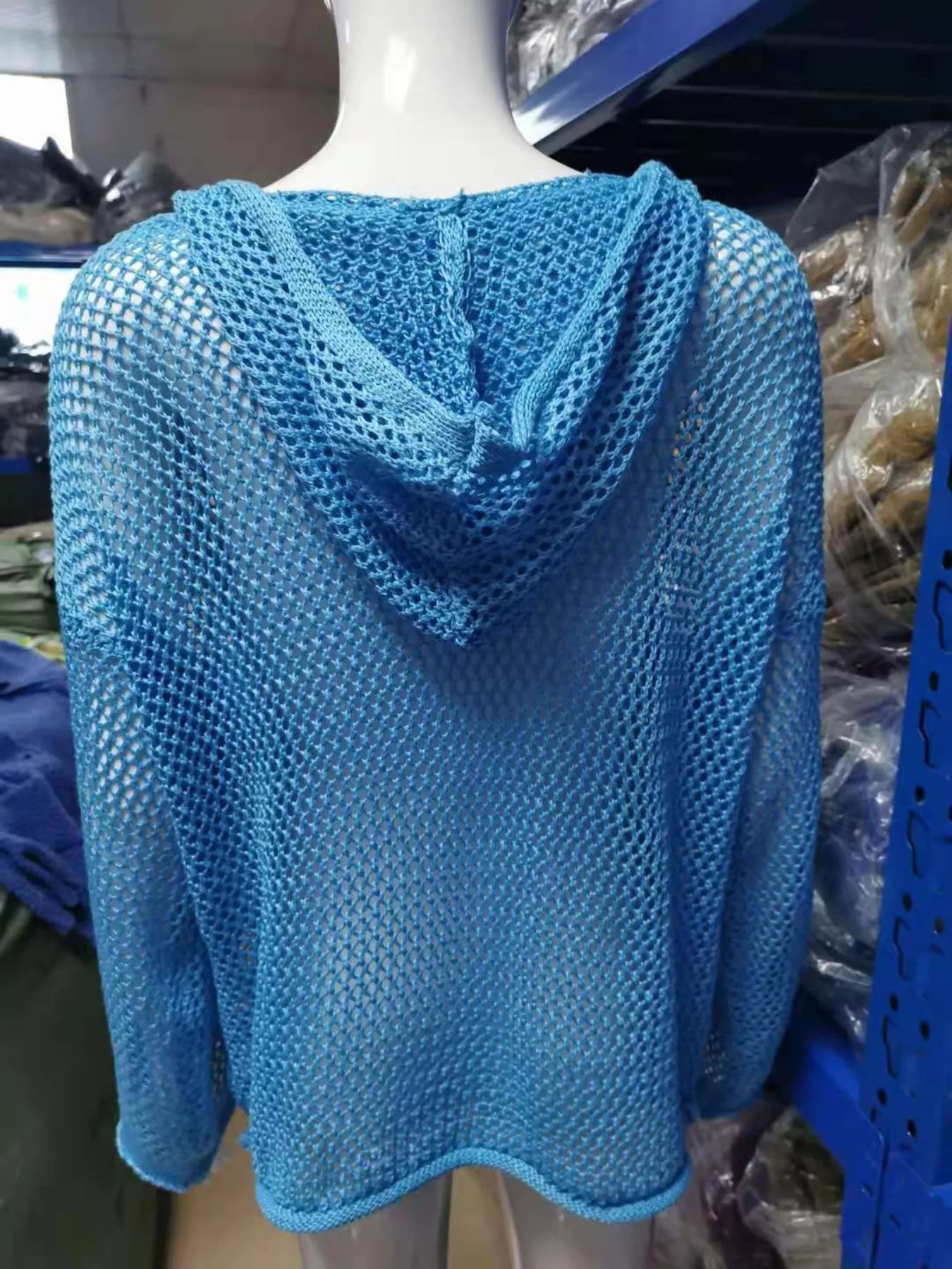 Crochet Hooded Knit Cover Up displaying a stylish back view in light blue color, perfect for layered looks.