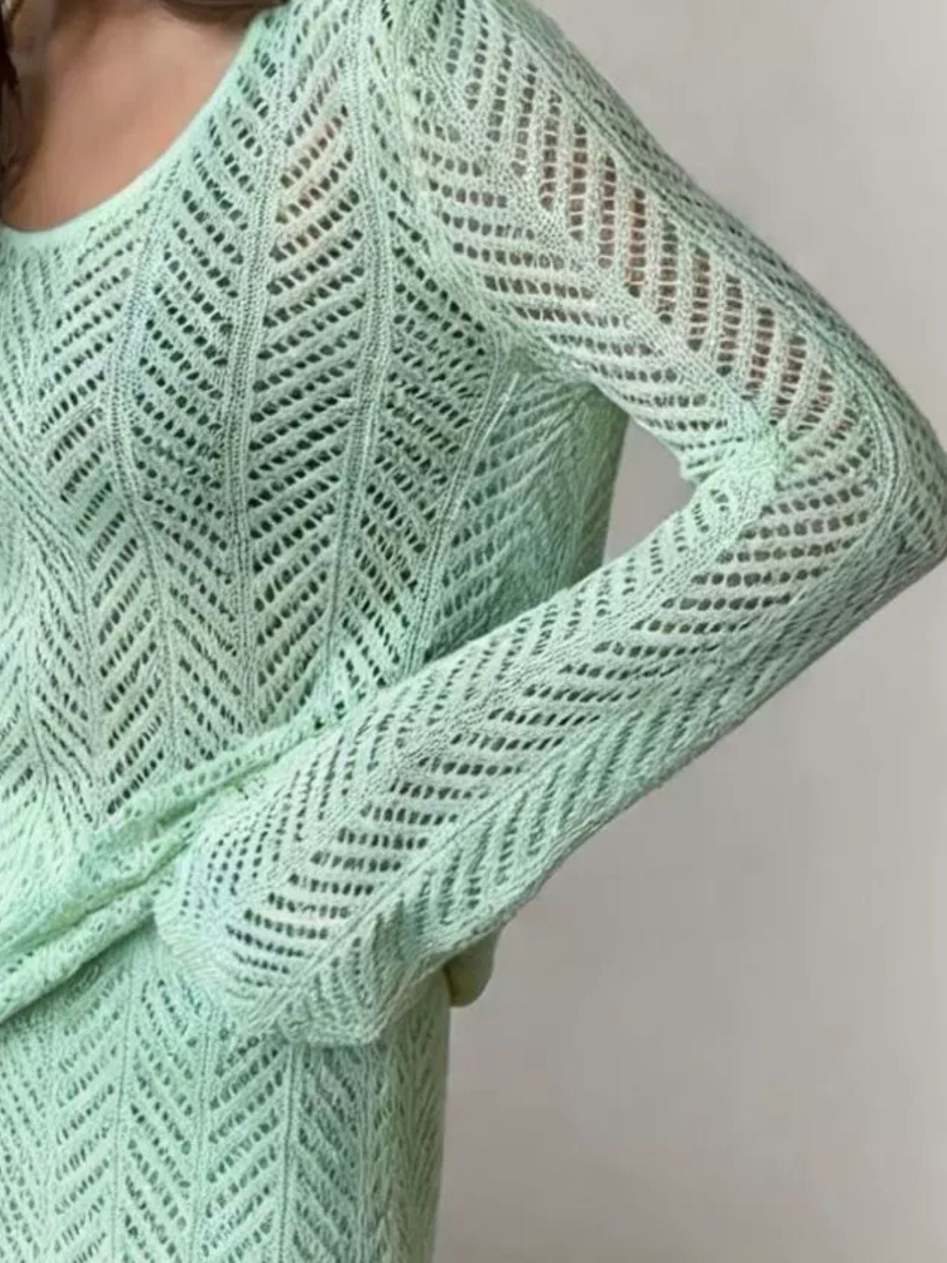 Openwork Long Sleeve Knit Top and Skirt Set detail showing the textured fabric in light mint green.