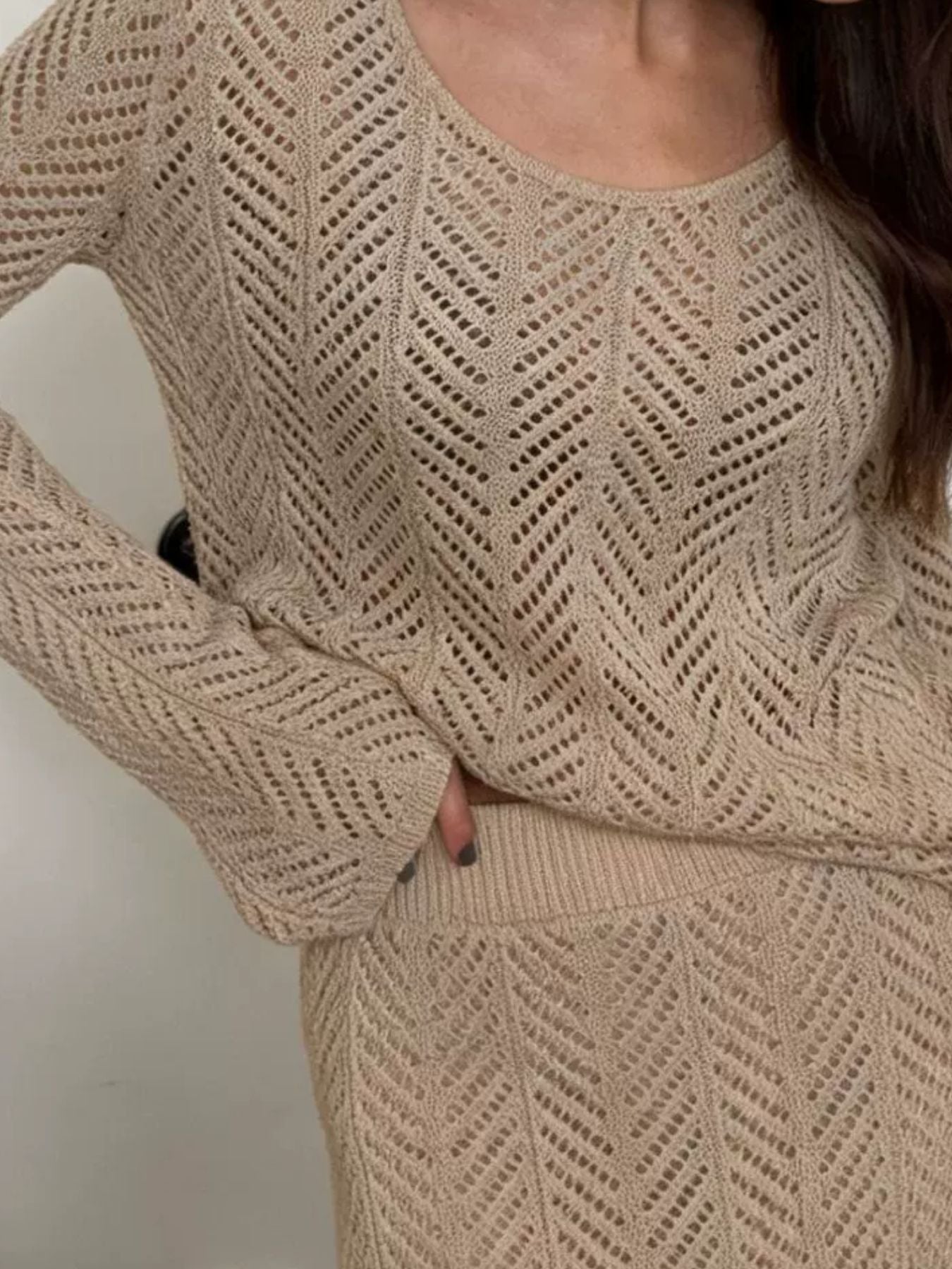Openwork Long Sleeve Knit Top and Skirt Set Elegant Women Outfit in beige with a stylish knitted design.