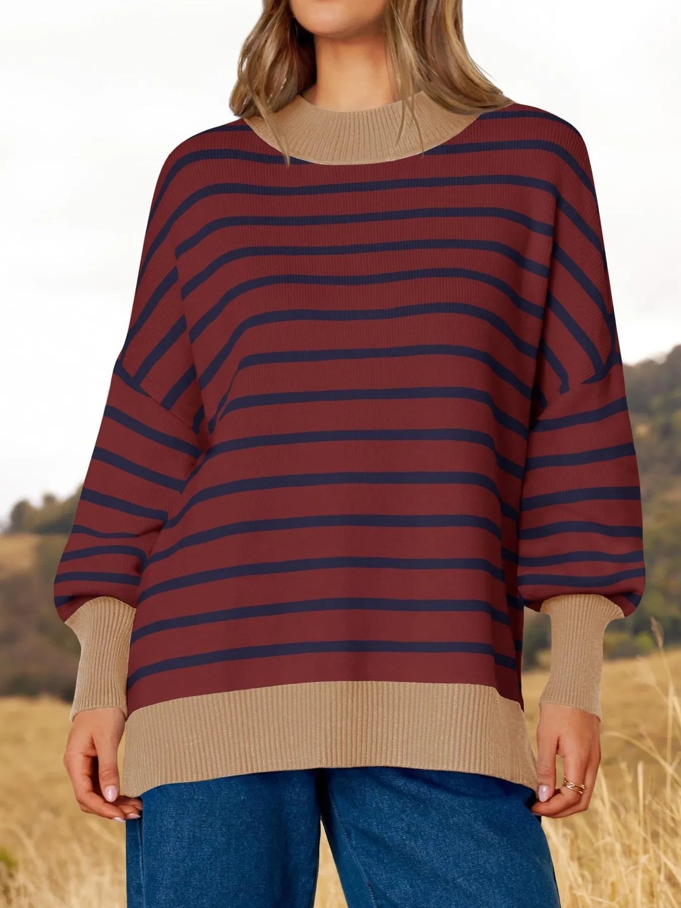 Striped Round Neck Long Sleeve Sweater featuring a cozy oversized fit and stylish stripes.