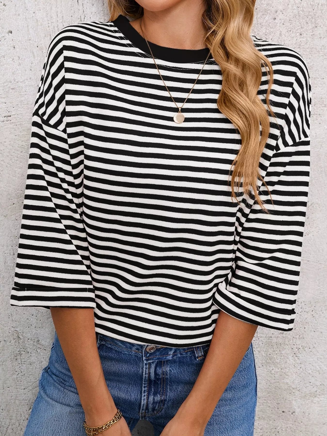 Striped Back Bow Tie T-Shirt featuring black and white stripes, oversized fit, and casual everyday style.