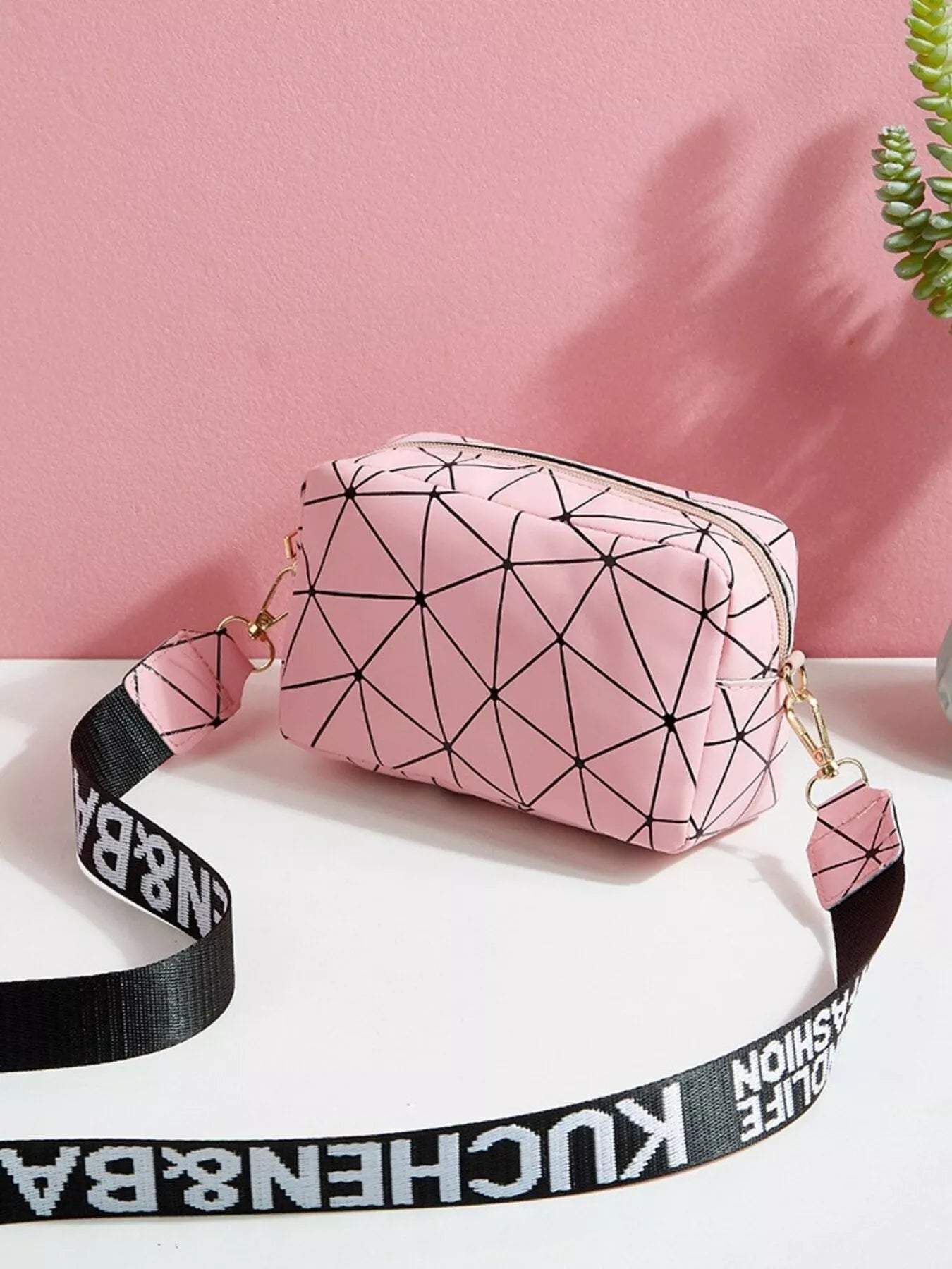 Geometric Pattern Crossbody Bag in pink with a stylish strap, perfect for everyday modern style.