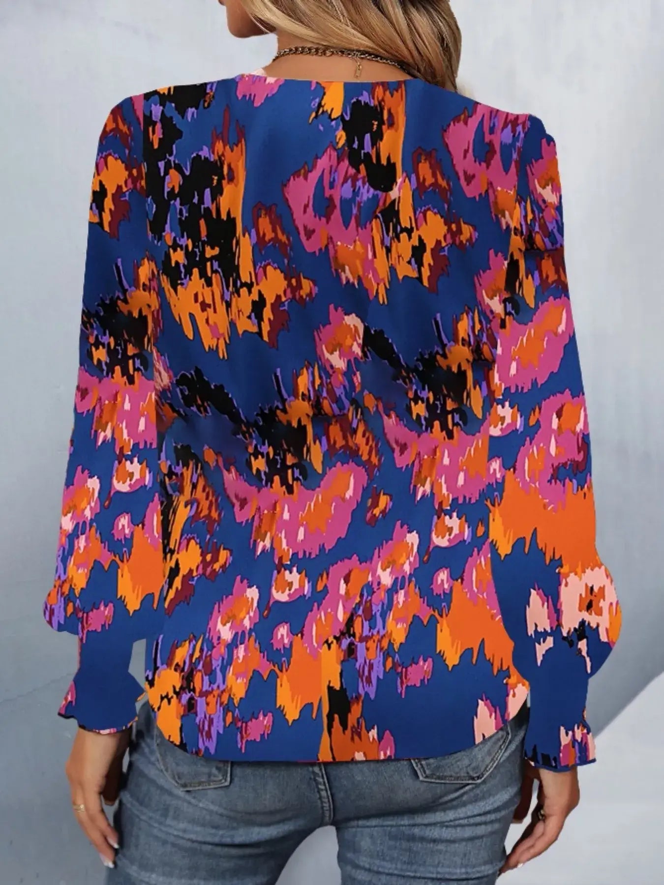 Printed button up long sleeve shirt showcased in vibrant colors and stylish design, perfect for casual and smart occasions.