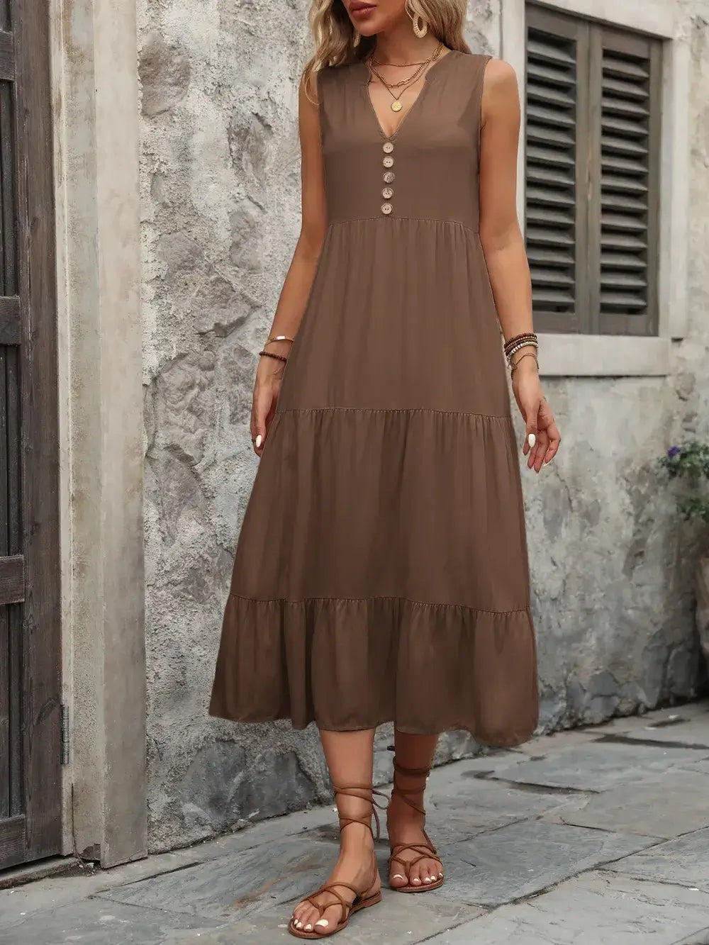 Ivy Lane Decorative Button Notched Sleeveless Dress in brown with decorative buttons and tiered design.