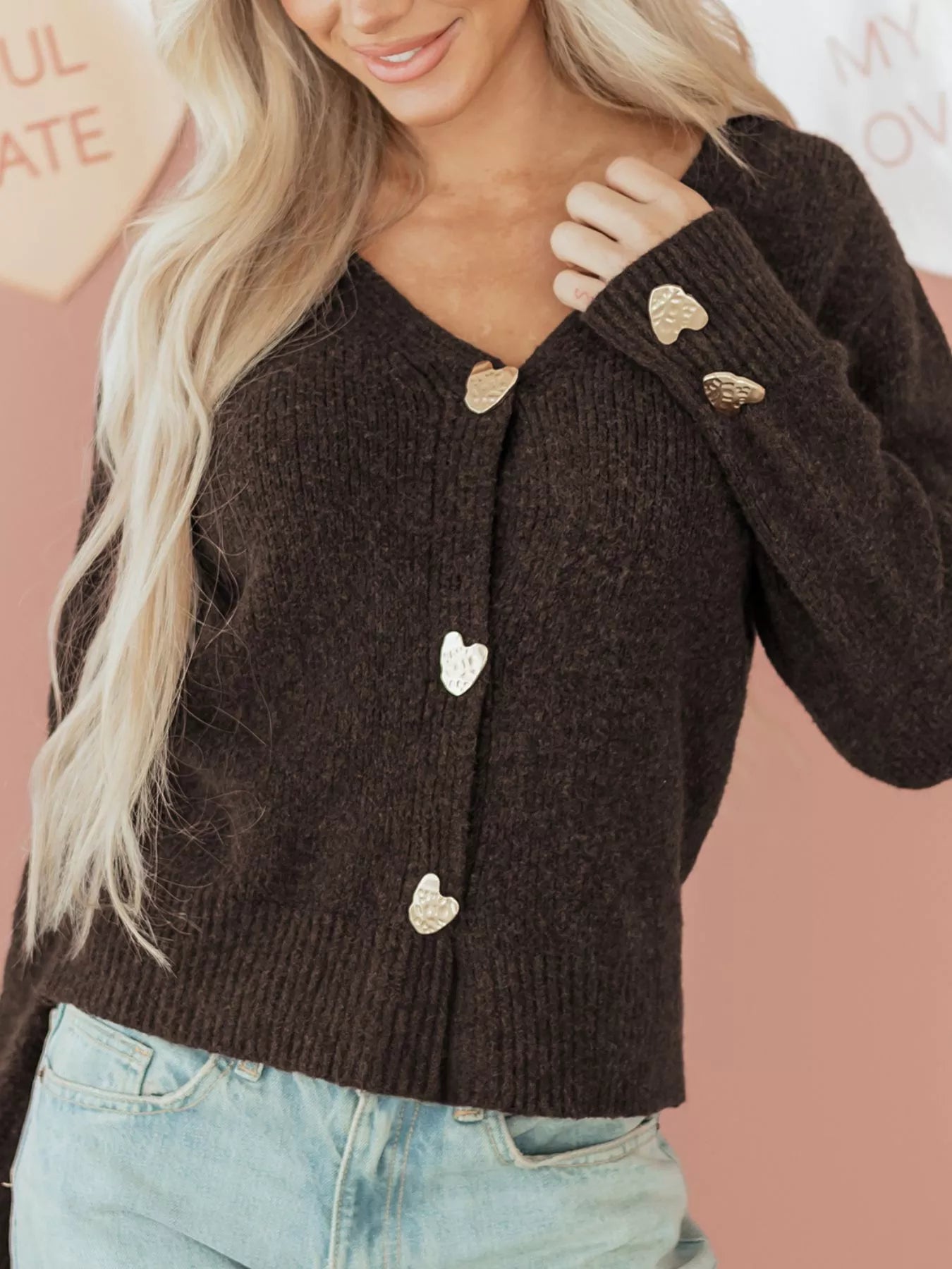 Woman wearing Heart Metal Button V Neck Cardigan Sweater with heart-shaped buttons and a cozy fit.