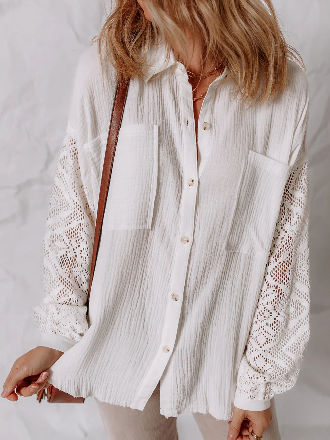 Lace Sleeve Button Down Shirt with eyelet detail, featuring pockets and buttoned front for elegant everyday style.