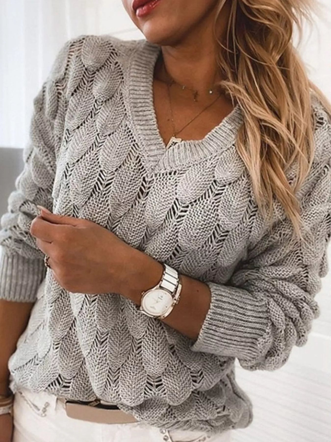 V-Neck Knitted Sweater in light gray with openwork knit design and cozy fit for everyday wear.