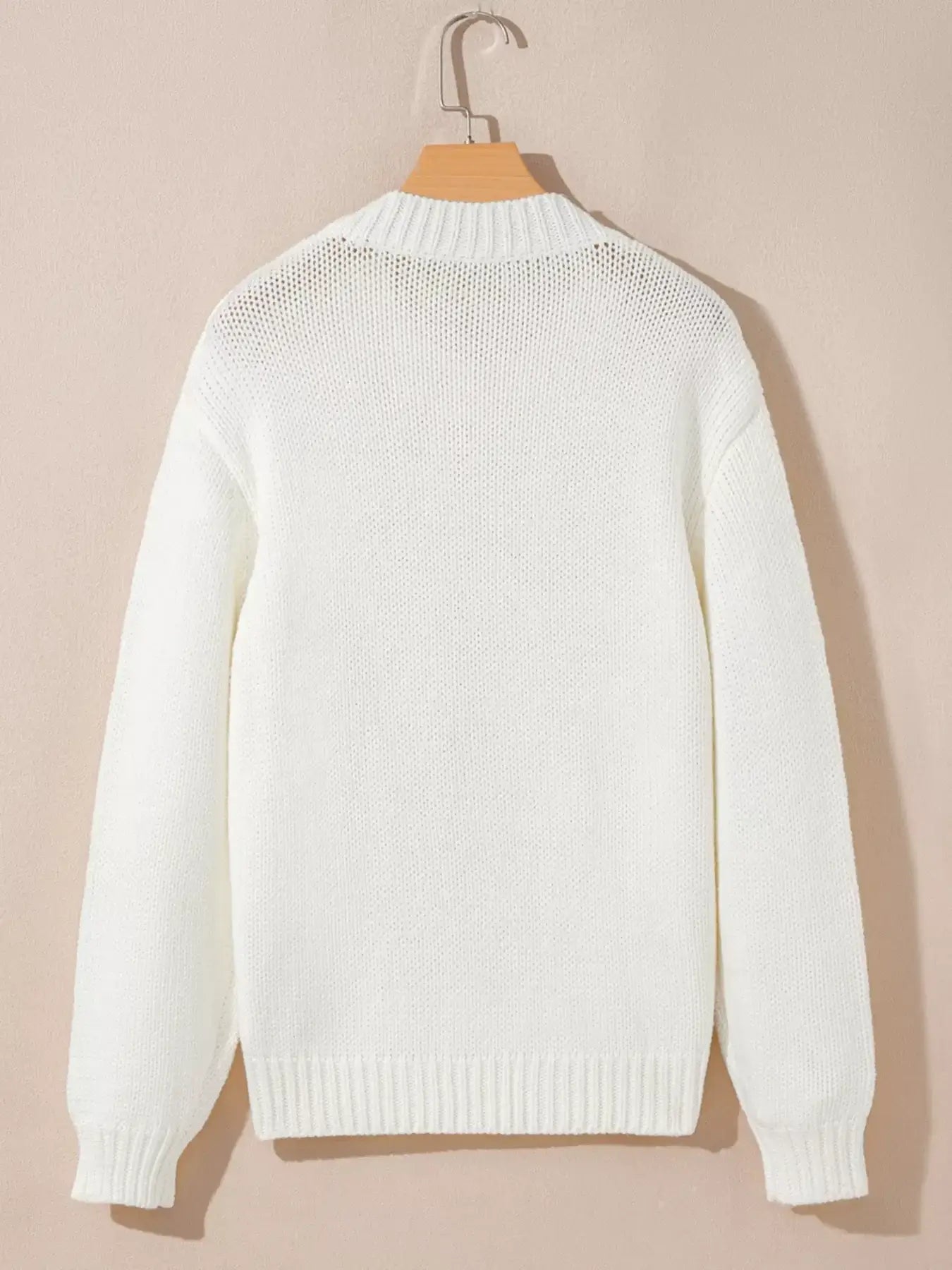 Back view of the embroidered bow boots graphic drop shoulder sweater in white, showcasing its cozy knit texture.