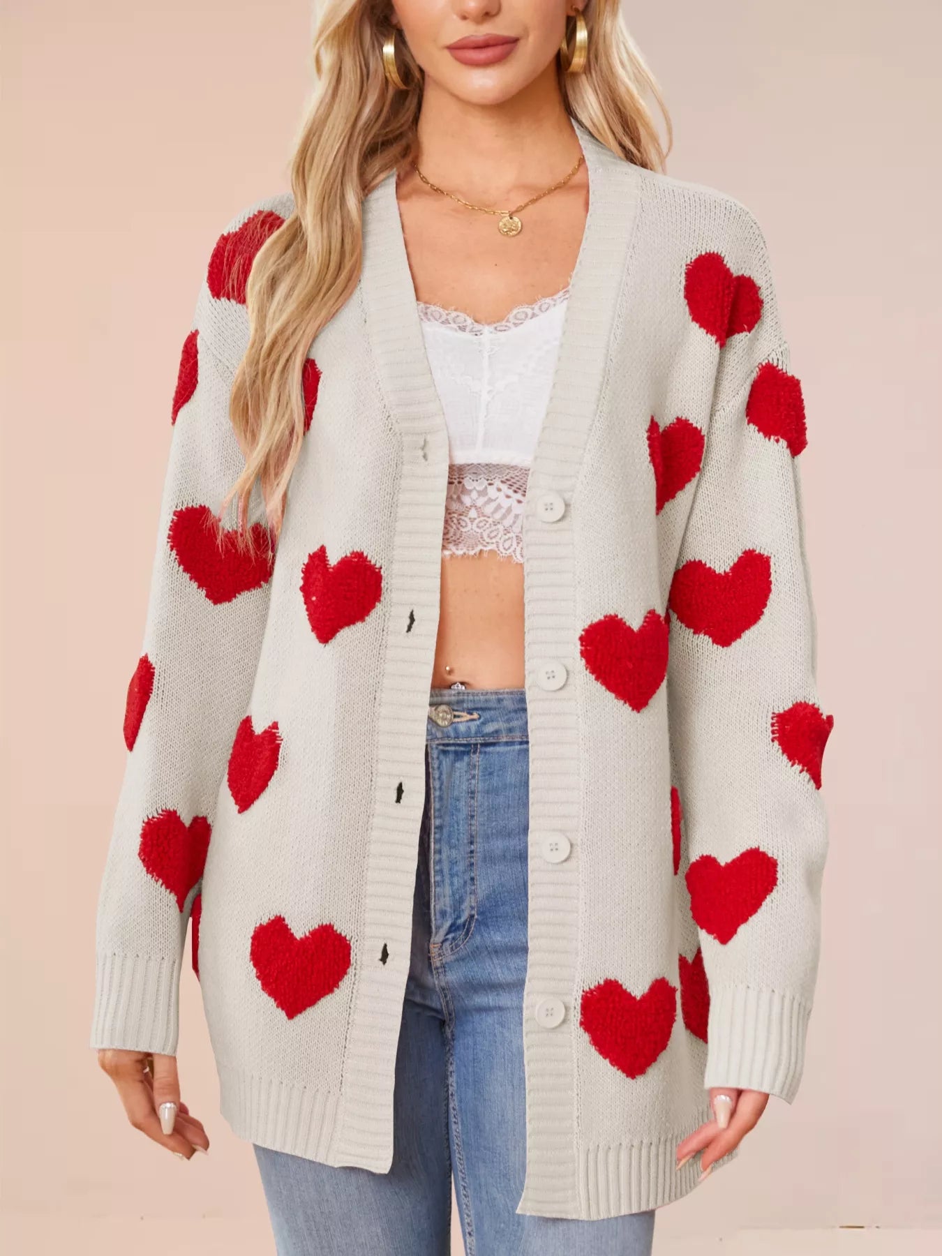 Heart Pattern Knit Button Up Cardigan for Women with red hearts, ribbed detail, slightly stretchy fabric.
