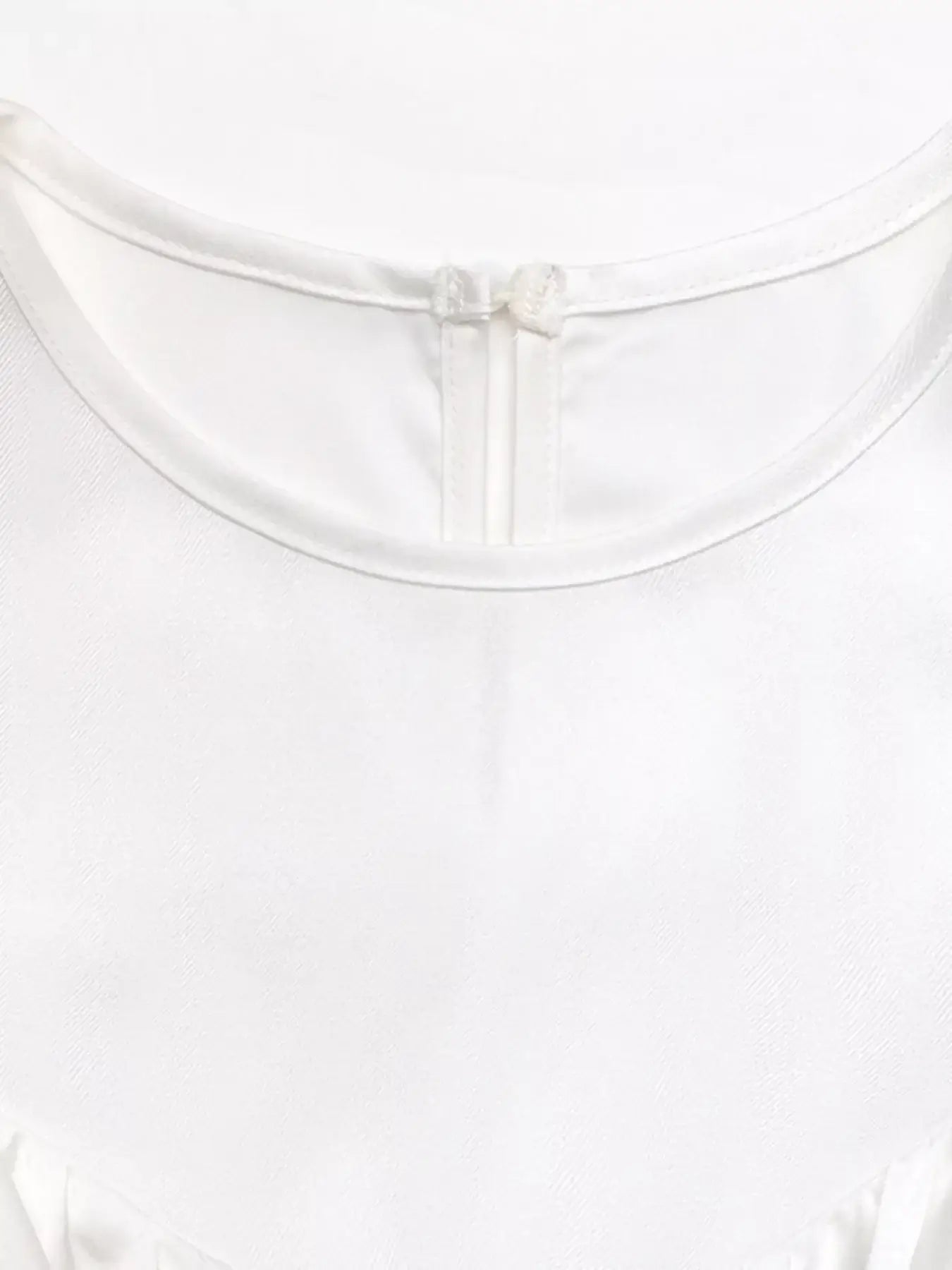 Back view of the Ruffled Cold Shoulder Flounce Sleeve Blouse showcasing the elegant neckline and zipper detail.