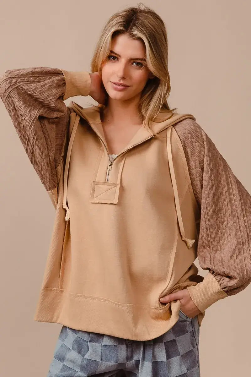 BiBi Half Zip French Terry Hoodie with Knit Sleeves in soft beige, perfect for casual styling and comfort.