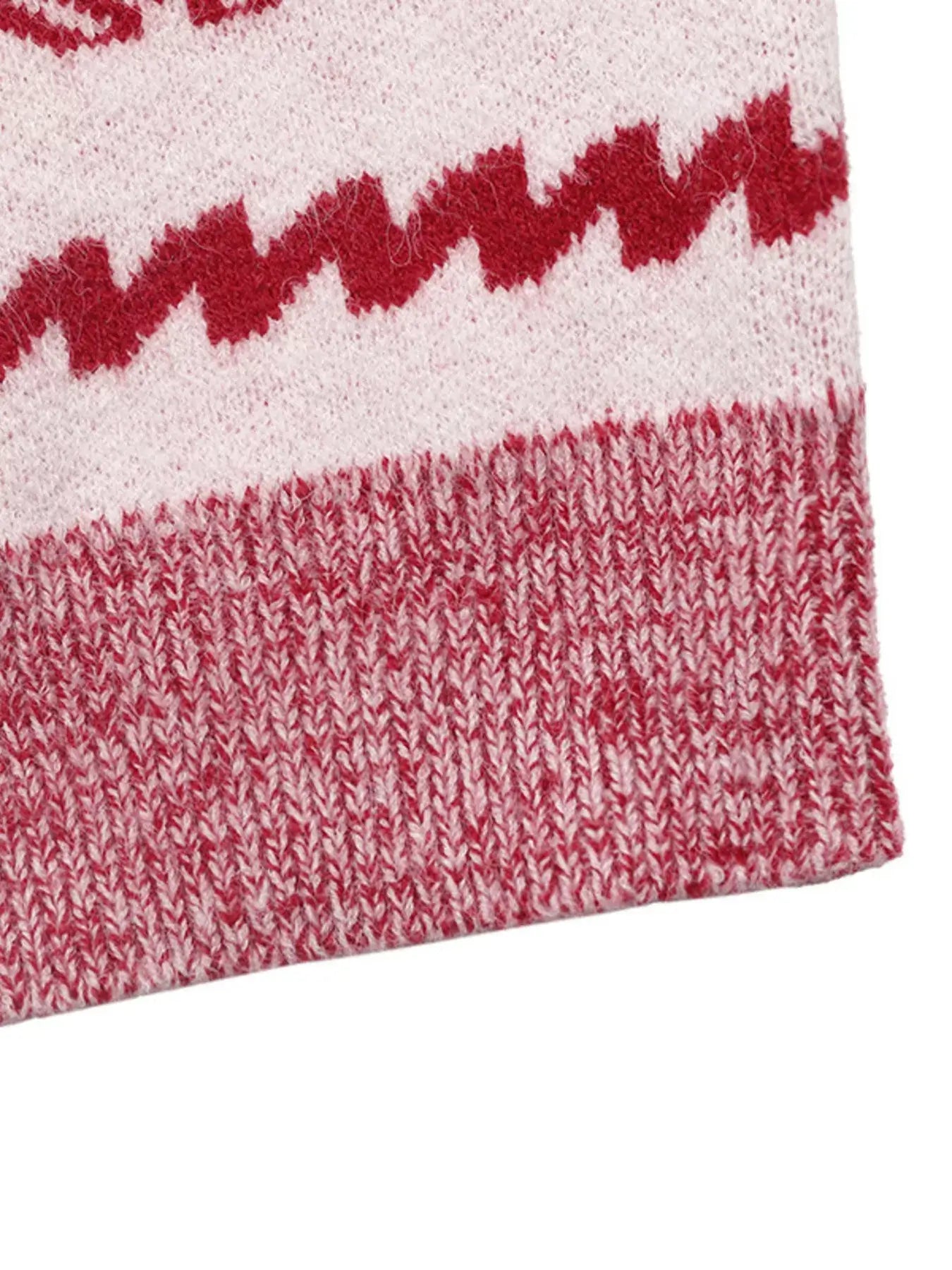 Detail of the CHEERS Christmas Round Neck Long Sleeve Sweater showcasing festive pattern and cozy knit texture.