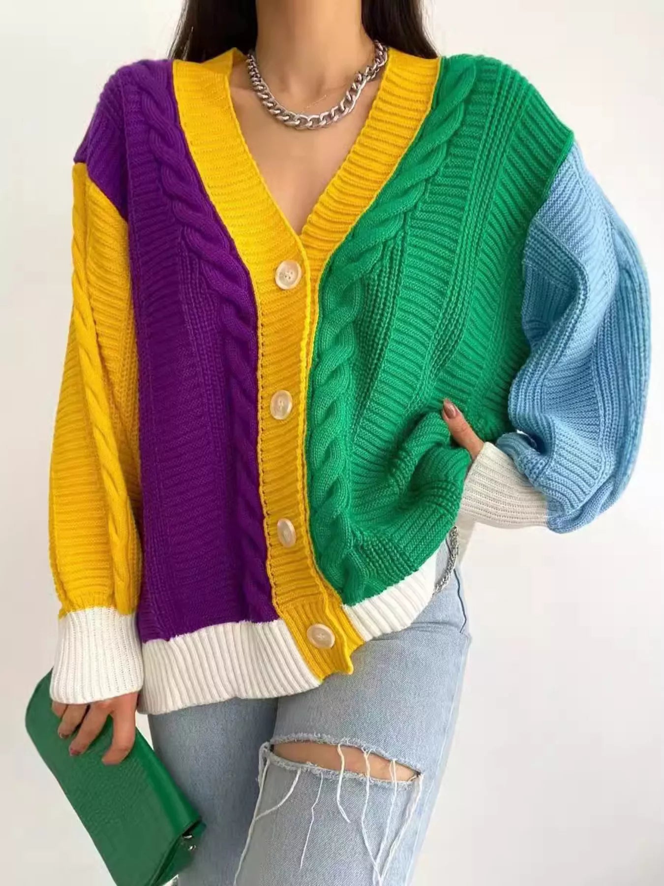 Color Block Button Down Cable-Knit Cardigan – Cozy Knit Layer worn by a model, featuring vibrant yellow, green, blue, and purple colors.
