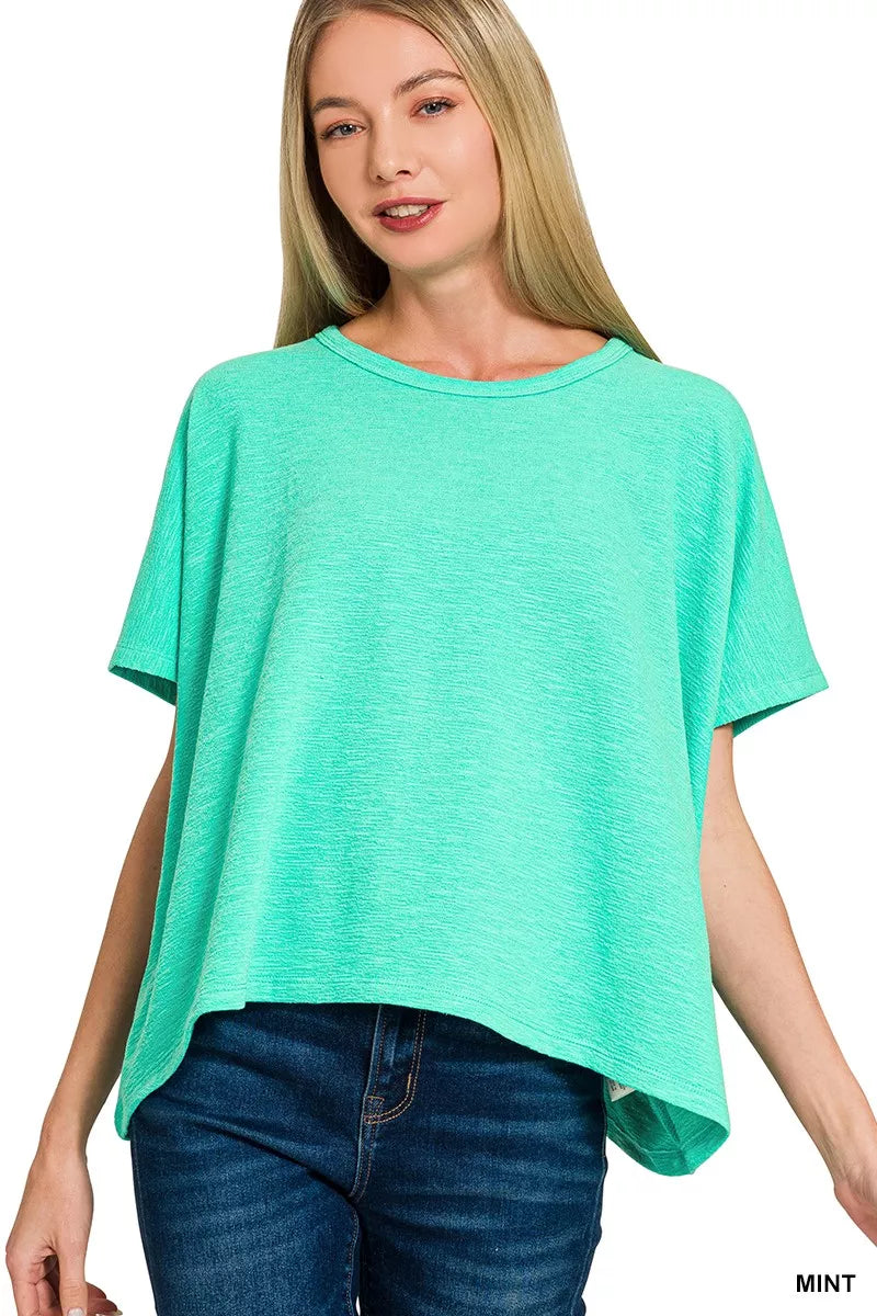 Cotton Slub Oversized Tee in mint green color, showcasing a relaxed fit and soft fabric for everyday style.