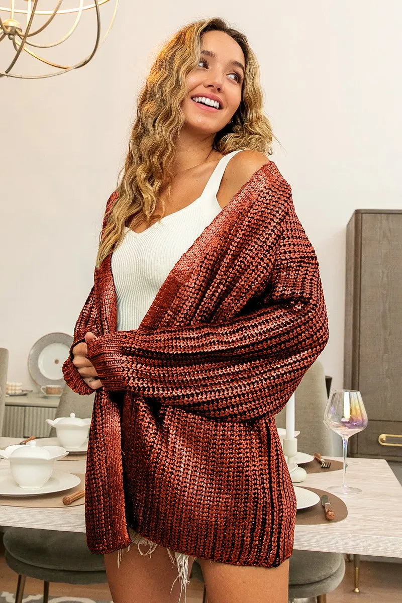 BiBi Metallic Knit V-neck Open Sweater Cardigan displayed on model, adding chic layers and glamour to any outfit.