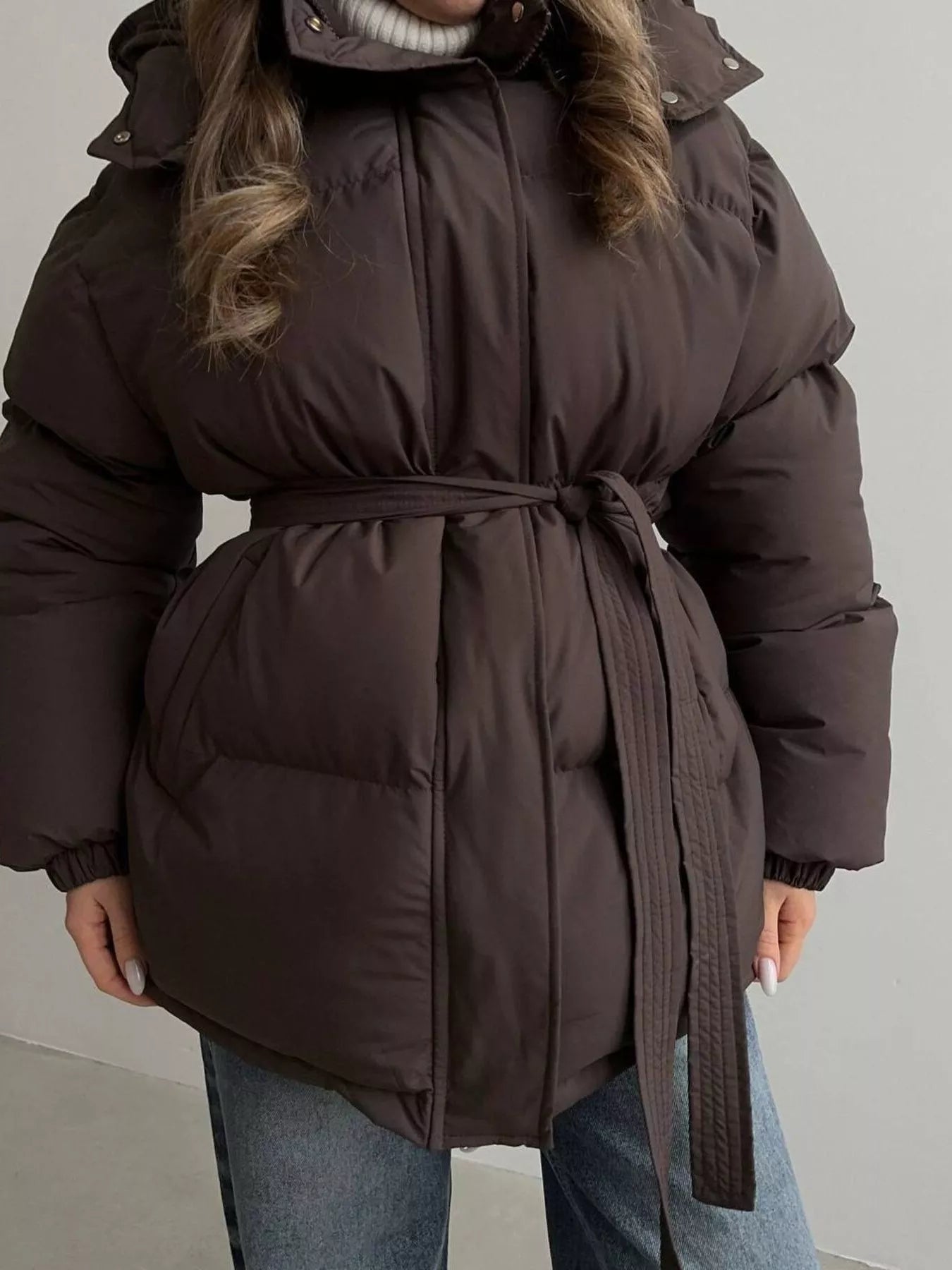 Mid Length Hooded Winter Coat Belted warm women jacket with pockets, thick, and stylish design.