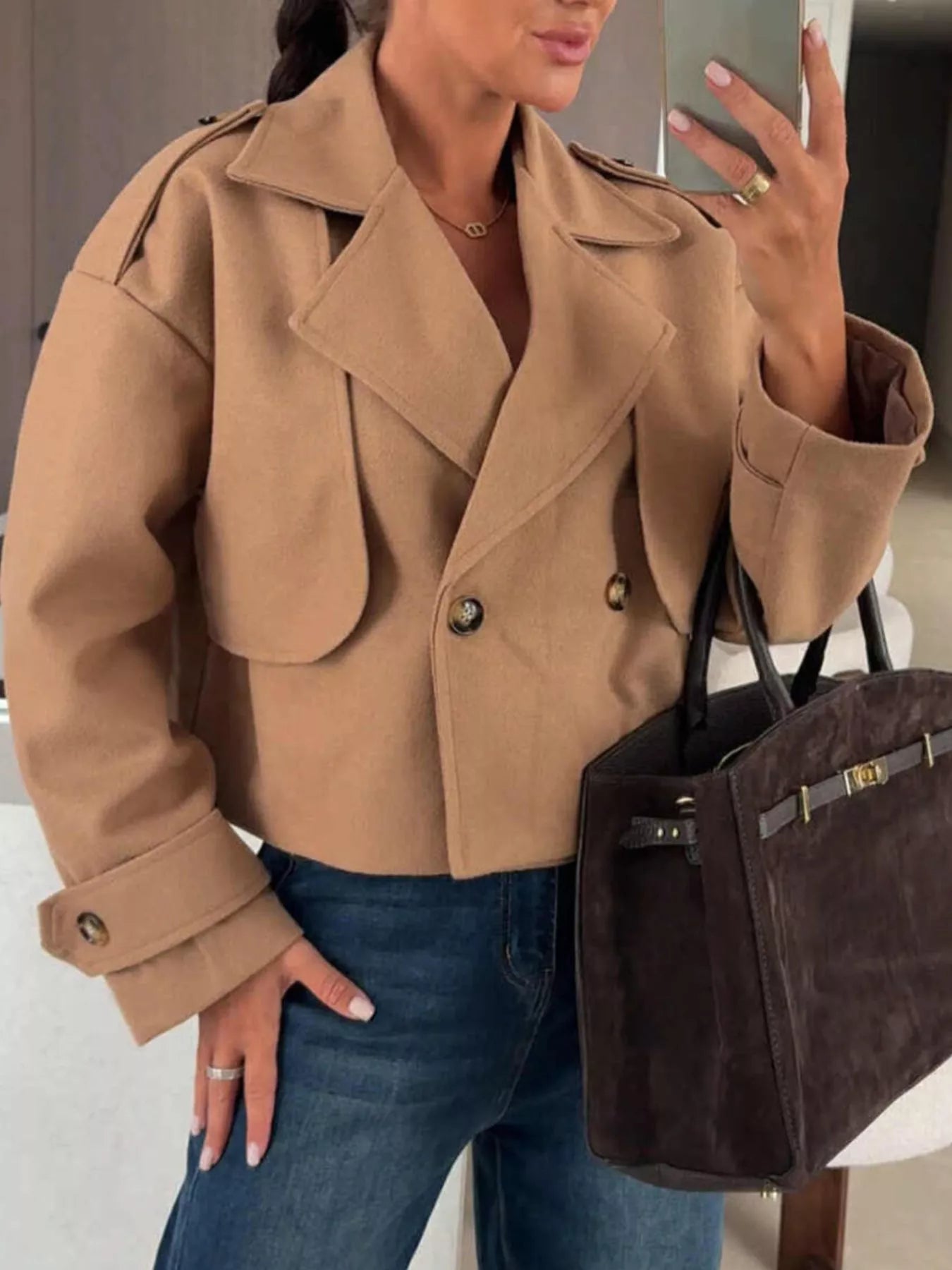 Double-Breasted Cropped Outerwear in beige, perfect for modern layered looks with buttoned details.