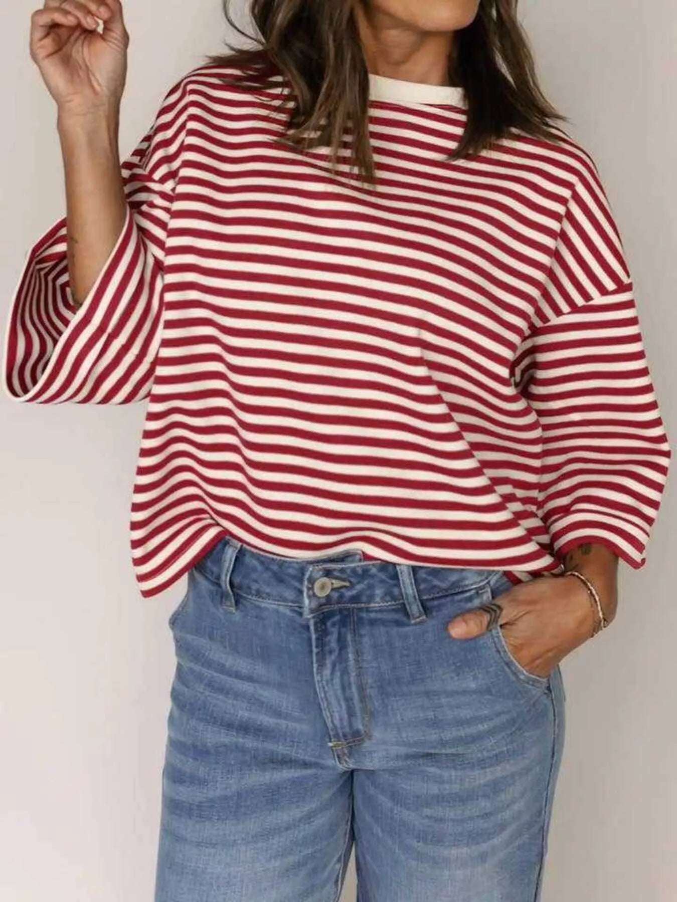 Striped Back Bow Tie T-Shirt for Casual Everyday Style, featuring red and white stripes and oversized sleeves.