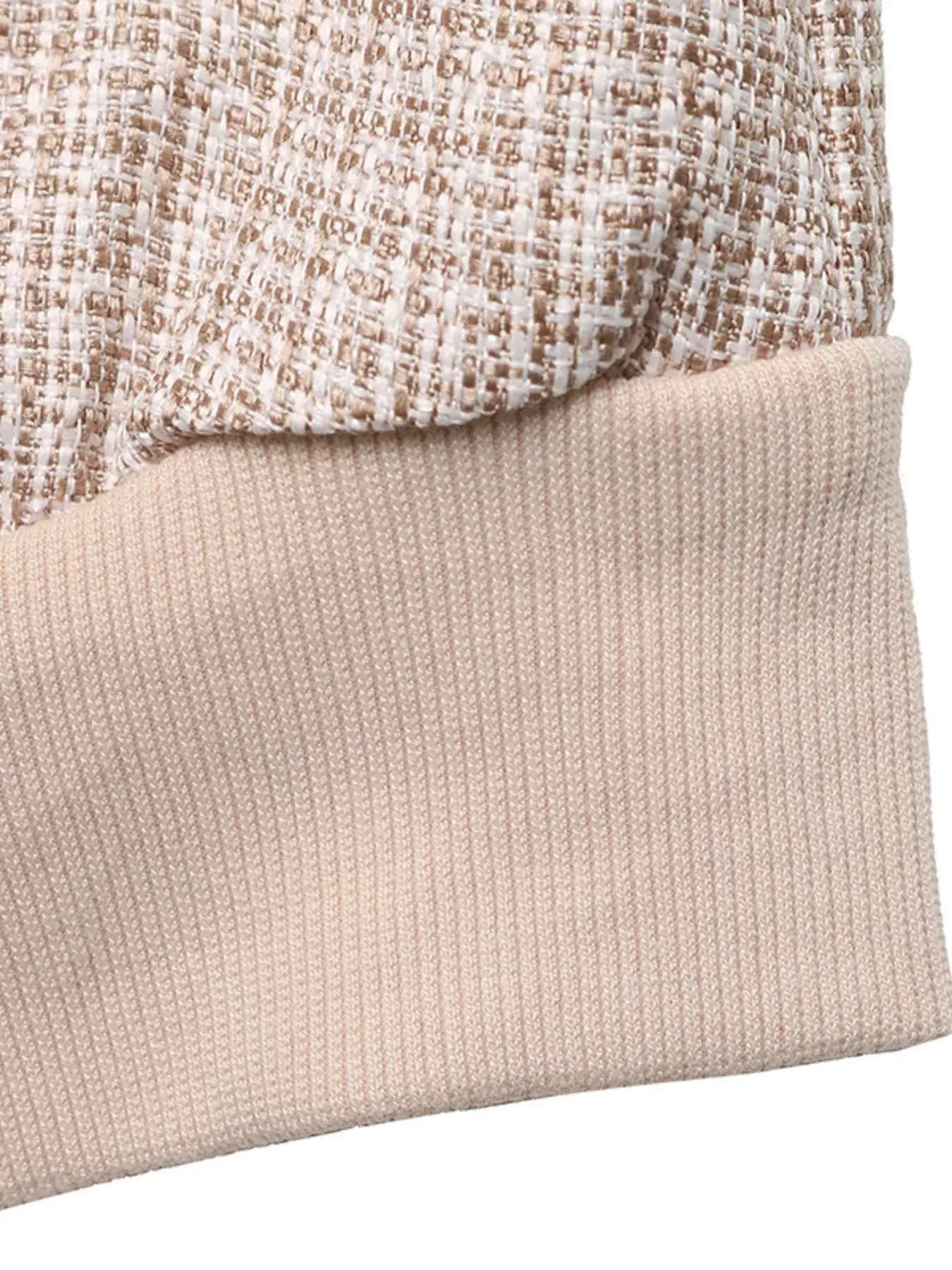 Detail view of the fabric and cuff of the Button Up Long Sleeve Jacket with Pockets for Women.