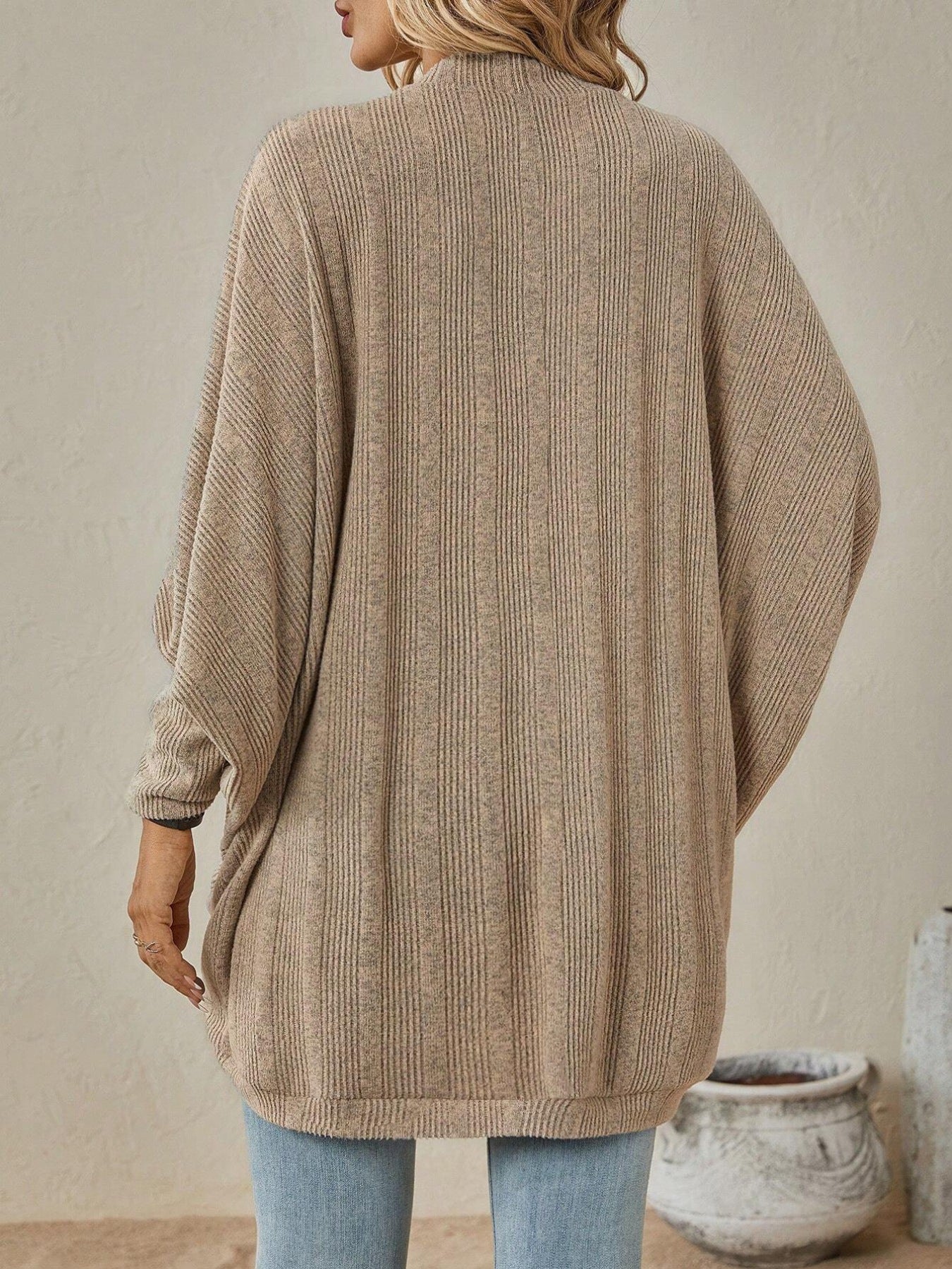 Back view of Open Front Batwing Sleeve Cardigan, showcasing lightweight fabric and batwing sleeves in neutral tone.