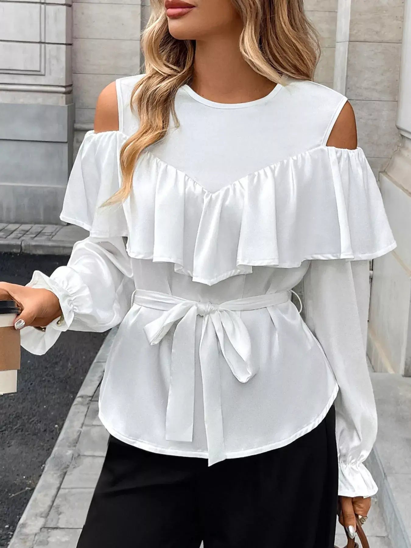 Ruffled Cold Shoulder Flounce Sleeve Blouse showcased on a model, featuring elegant ruffles and stylish cold-shoulder design.