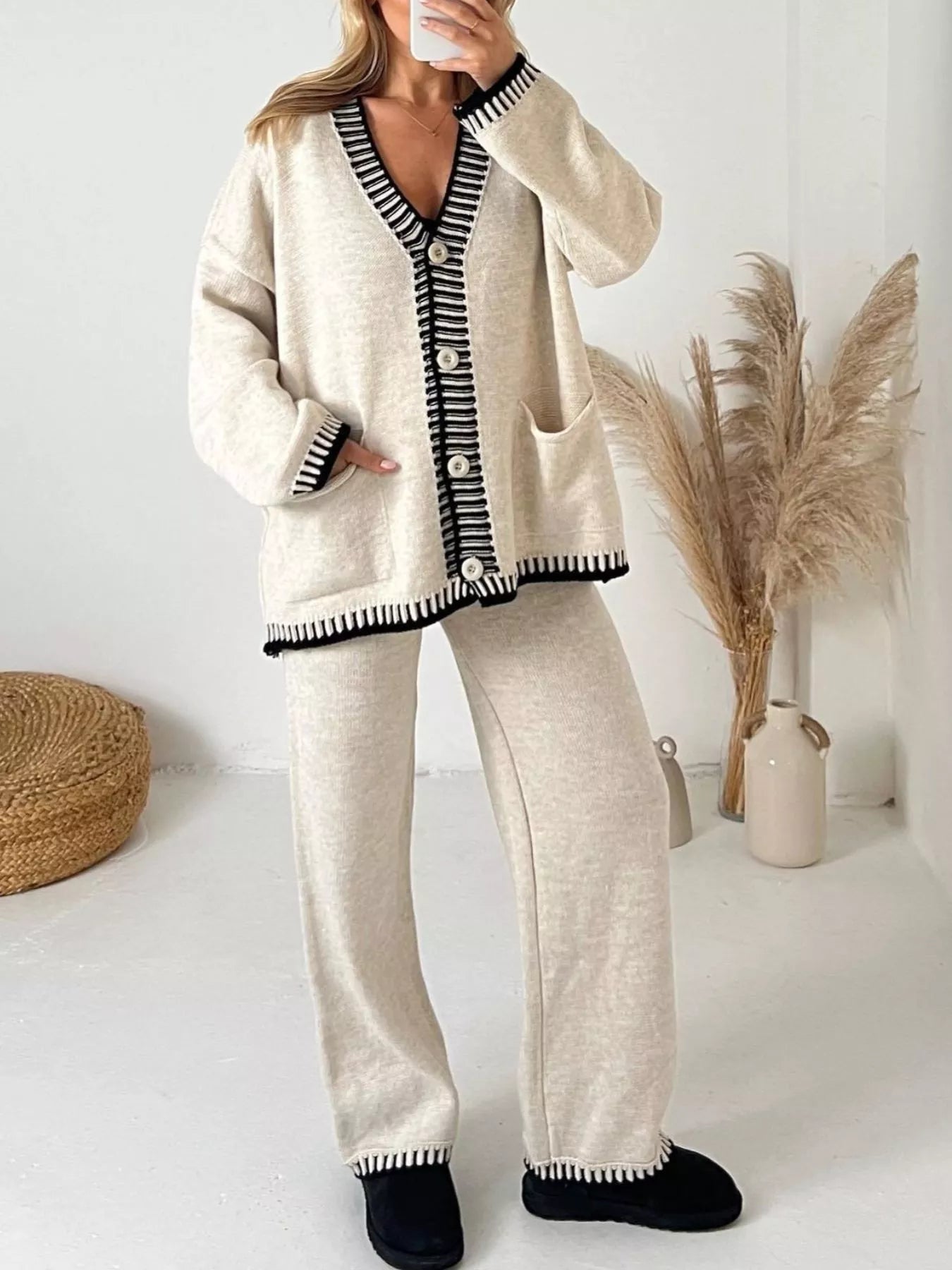 Button Up V-Neck Cardigan and Pants Sweater Set featuring buttoned pockets and a relaxed fit look.