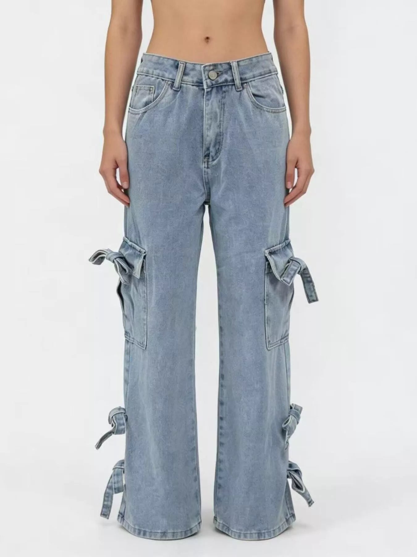 Bow Wide Leg Jeans with pocketed detail, relaxed fit, and stylish bow accents.