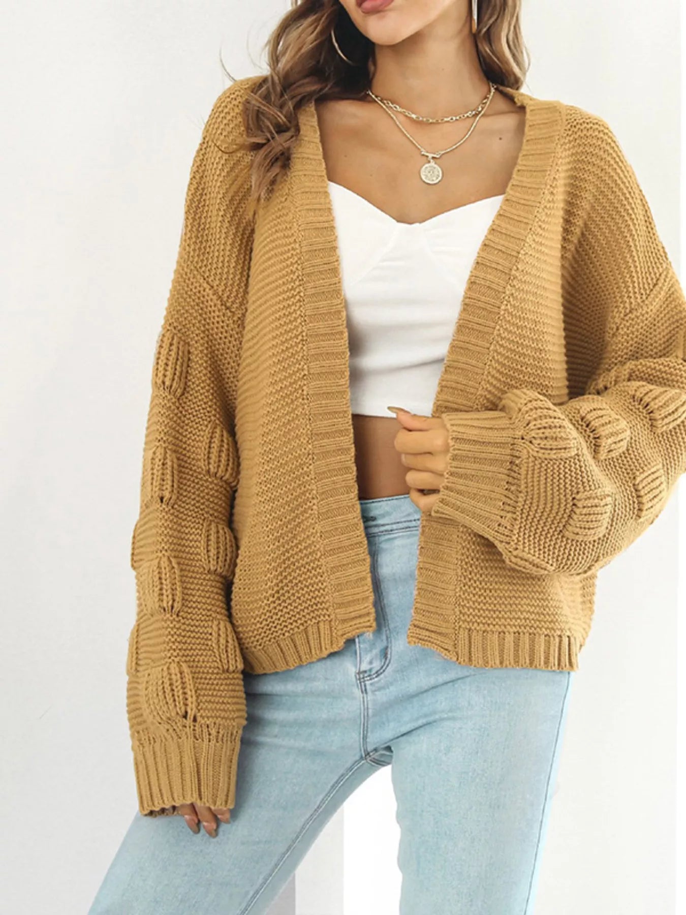 Chunky Knit Open Front Cardigan in a warm tan color, featuring ribbed details and a slightly stretchy design for cozy style.