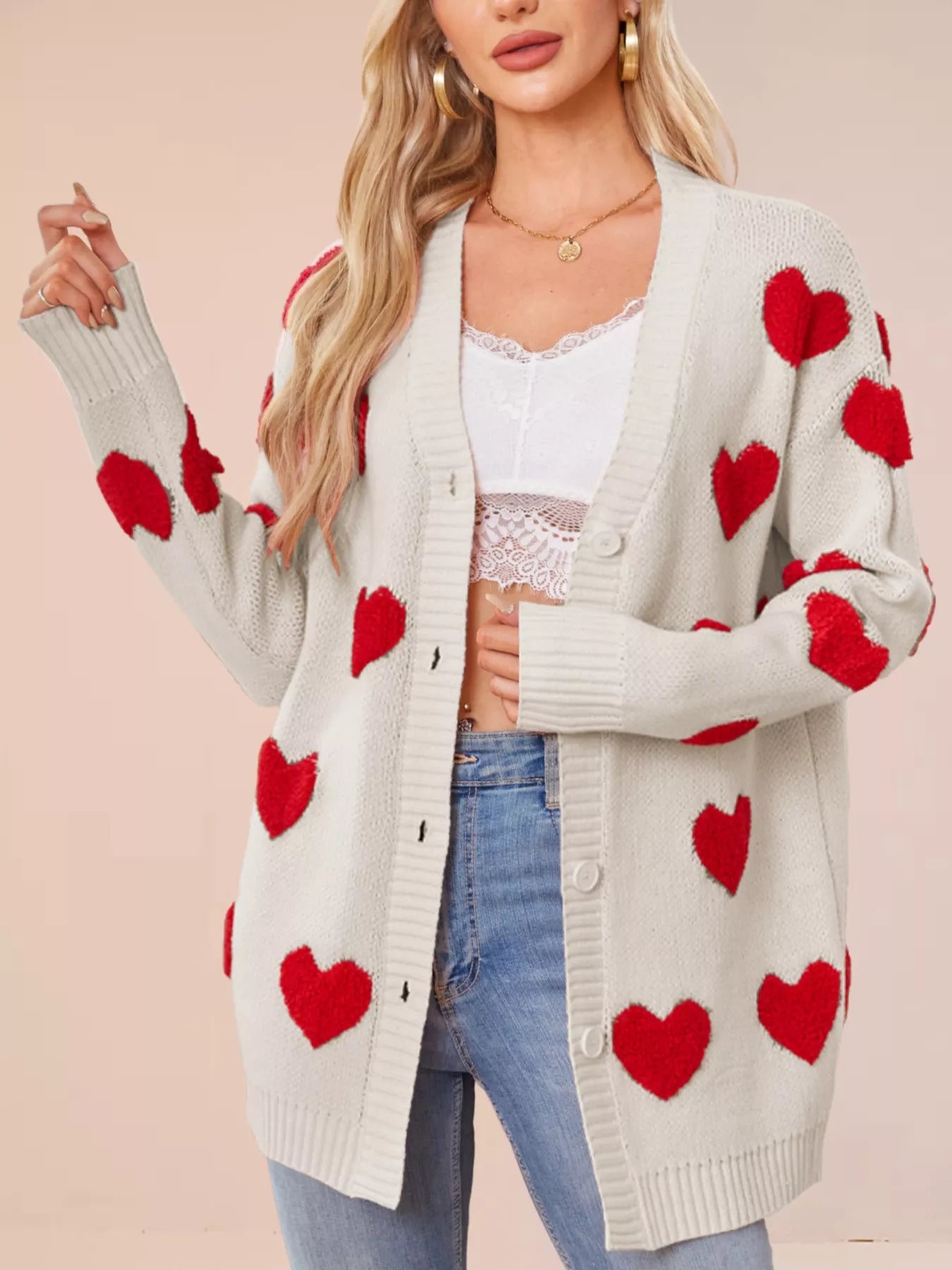 Heart Pattern Knit Button Up Cardigan for Women style featuring red hearts on a light grey background.