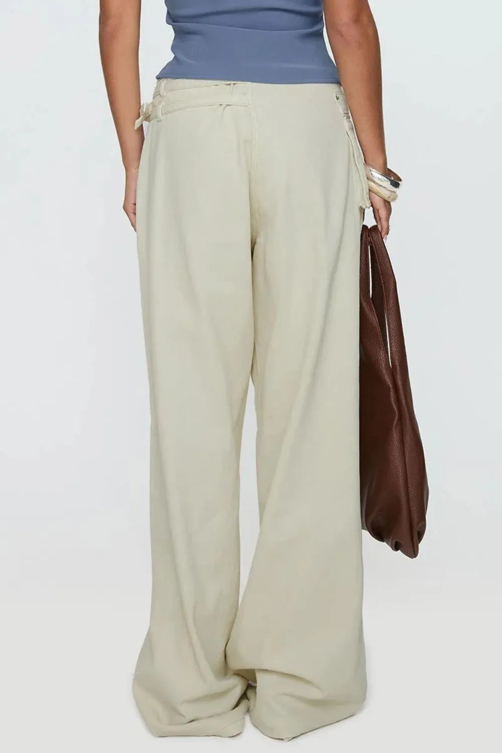 Wide Leg Jeans with Pockets, featuring a beige color, styled for comfortable everyday wear.
