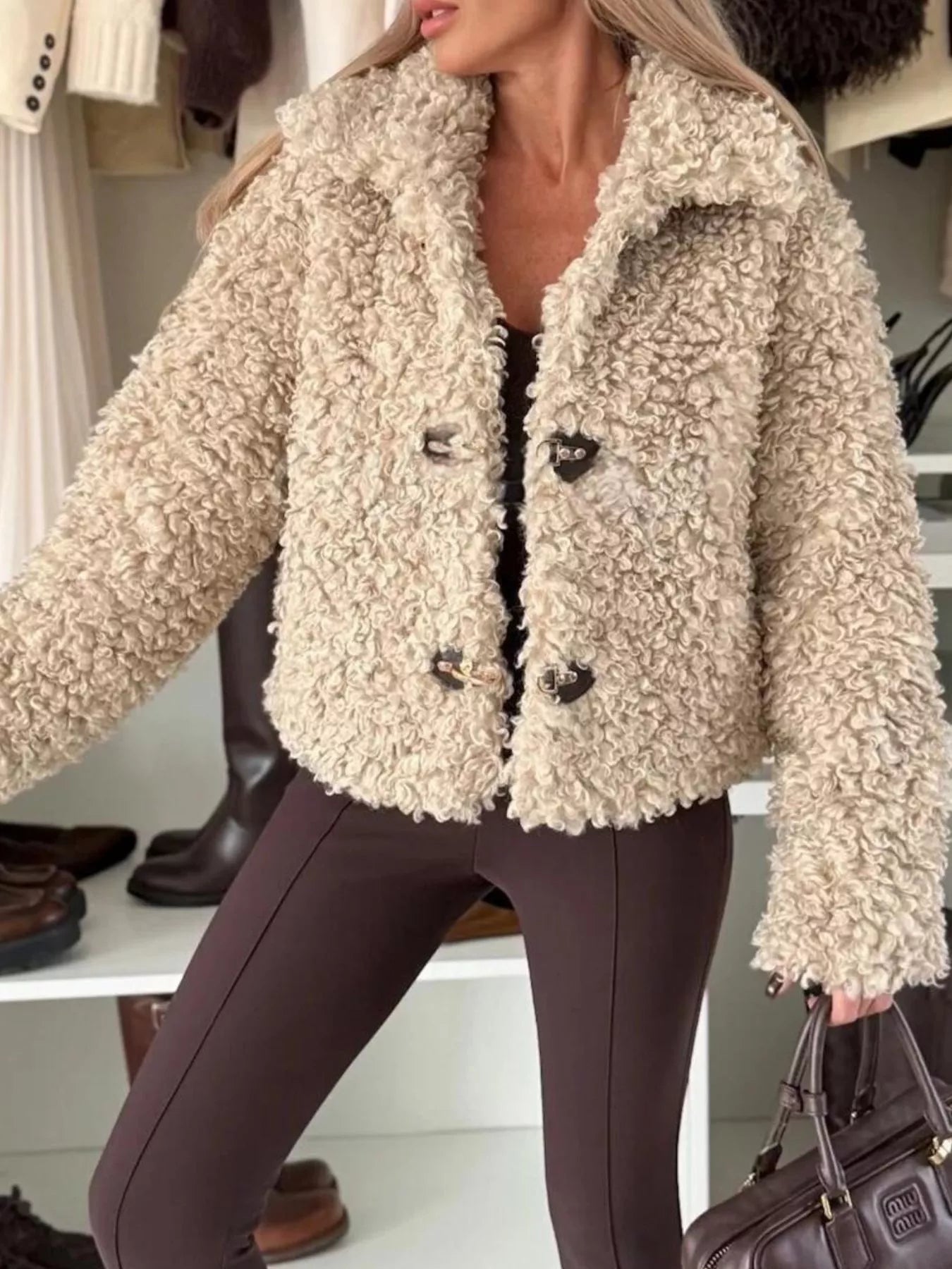 Sherpa Button-Down Outerwear in beige, featuring a textured, cozy design, perfect for layering in everyday outfits.