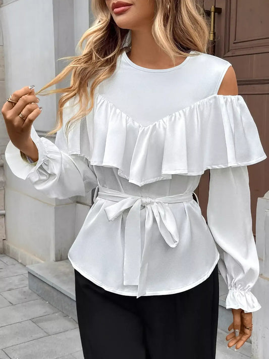 Model wearing a Ruffled Cold Shoulder Flounce Sleeve Blouse with elegant ruffle details and a belted waist.