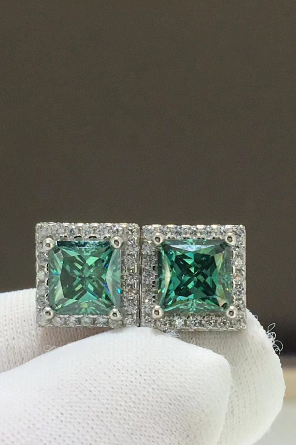 2 Carat Moissanite Square Stud Earrings in modern design with green gemstones and sparkling accents.