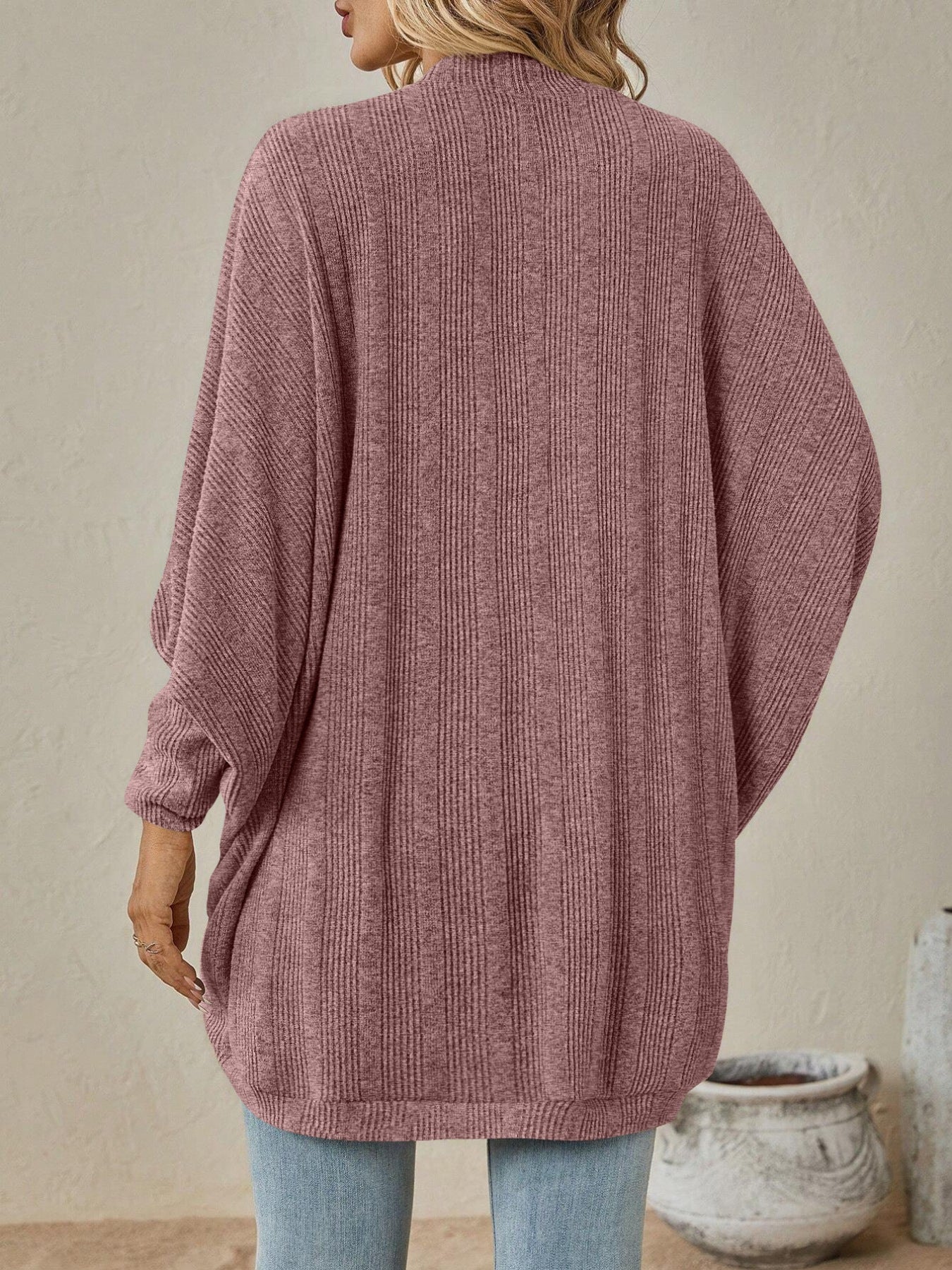 Open Front Batwing Sleeve Cardigan showcasing a lightweight fabric with batwing sleeves in a cozy pink hue.