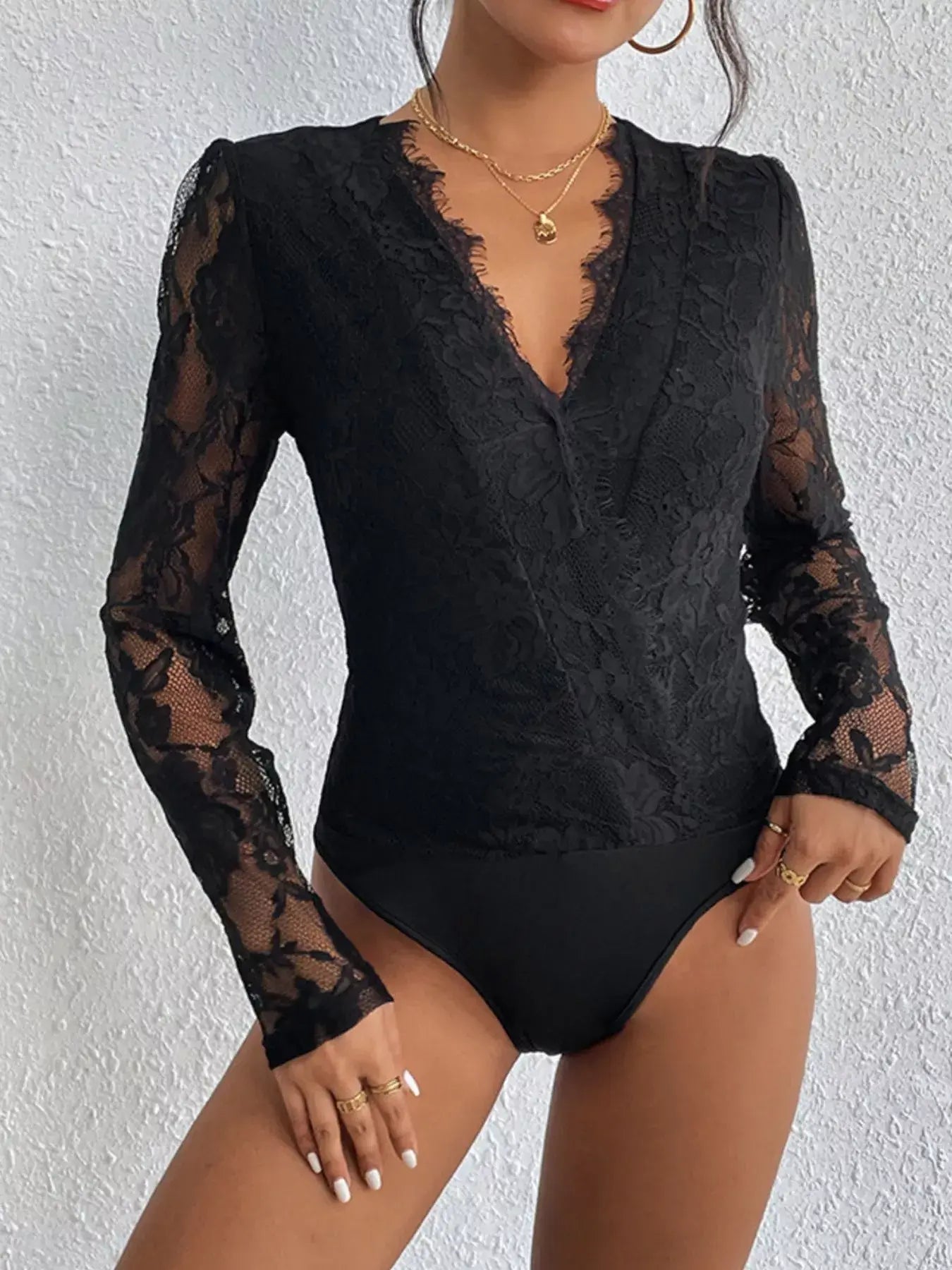 Lace V-Neck Long Sleeve Bodysuit featuring delicate lace detailing and a flattering silhouette.