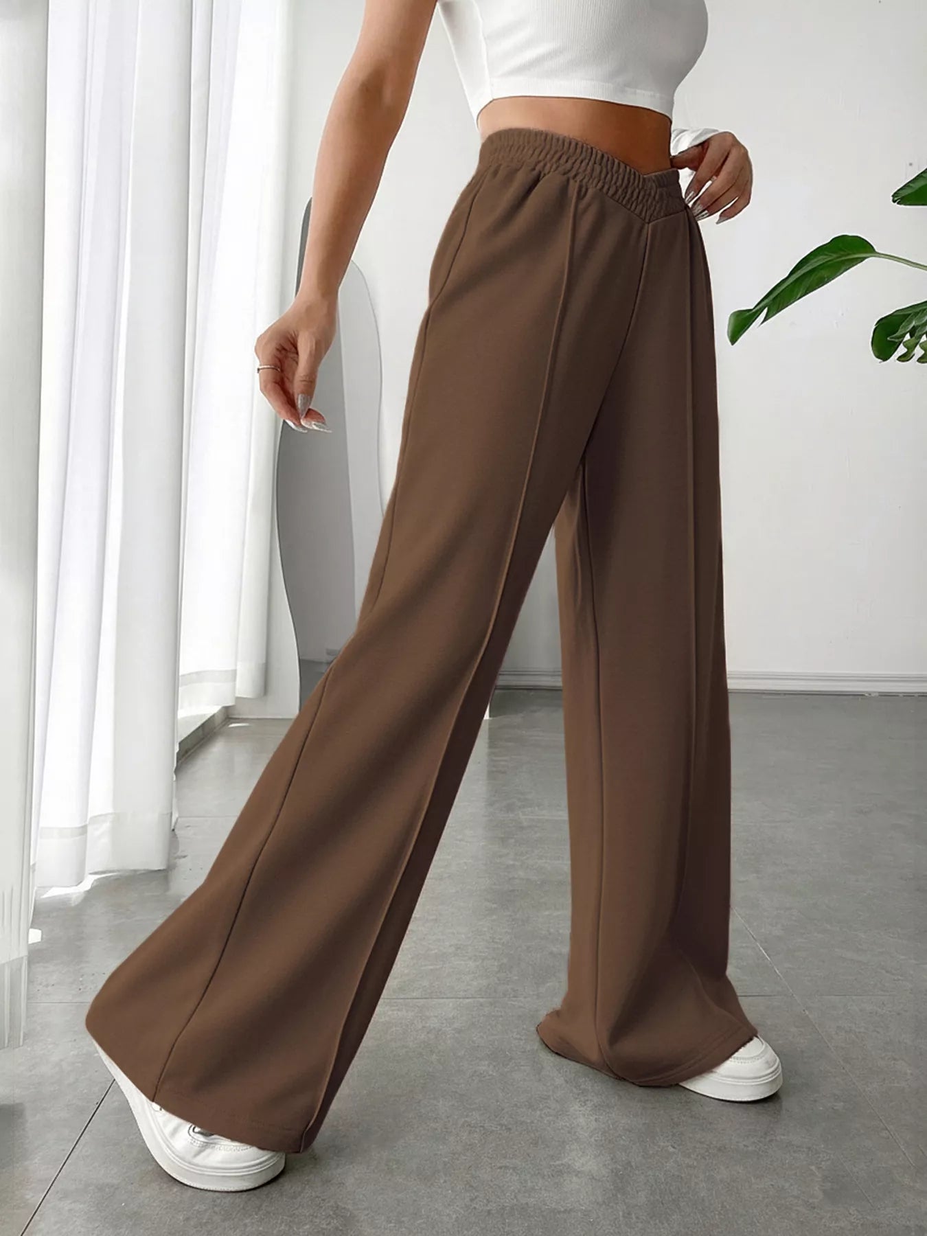 Wide Leg High Waist Pants in brown, featuring a relaxed fit and elastic waistband for an elegant everyday style.