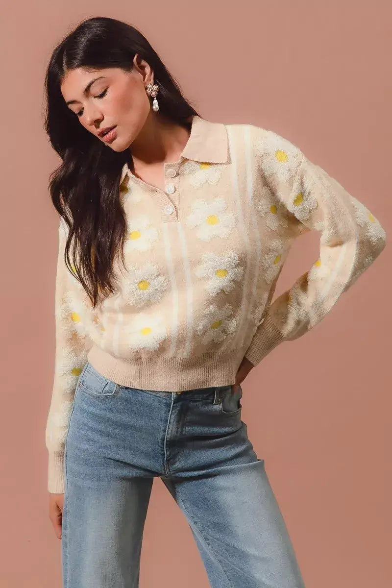 SO ME floral stripe polo collar sweater worn by a model with elegant styling and playful floral designs.